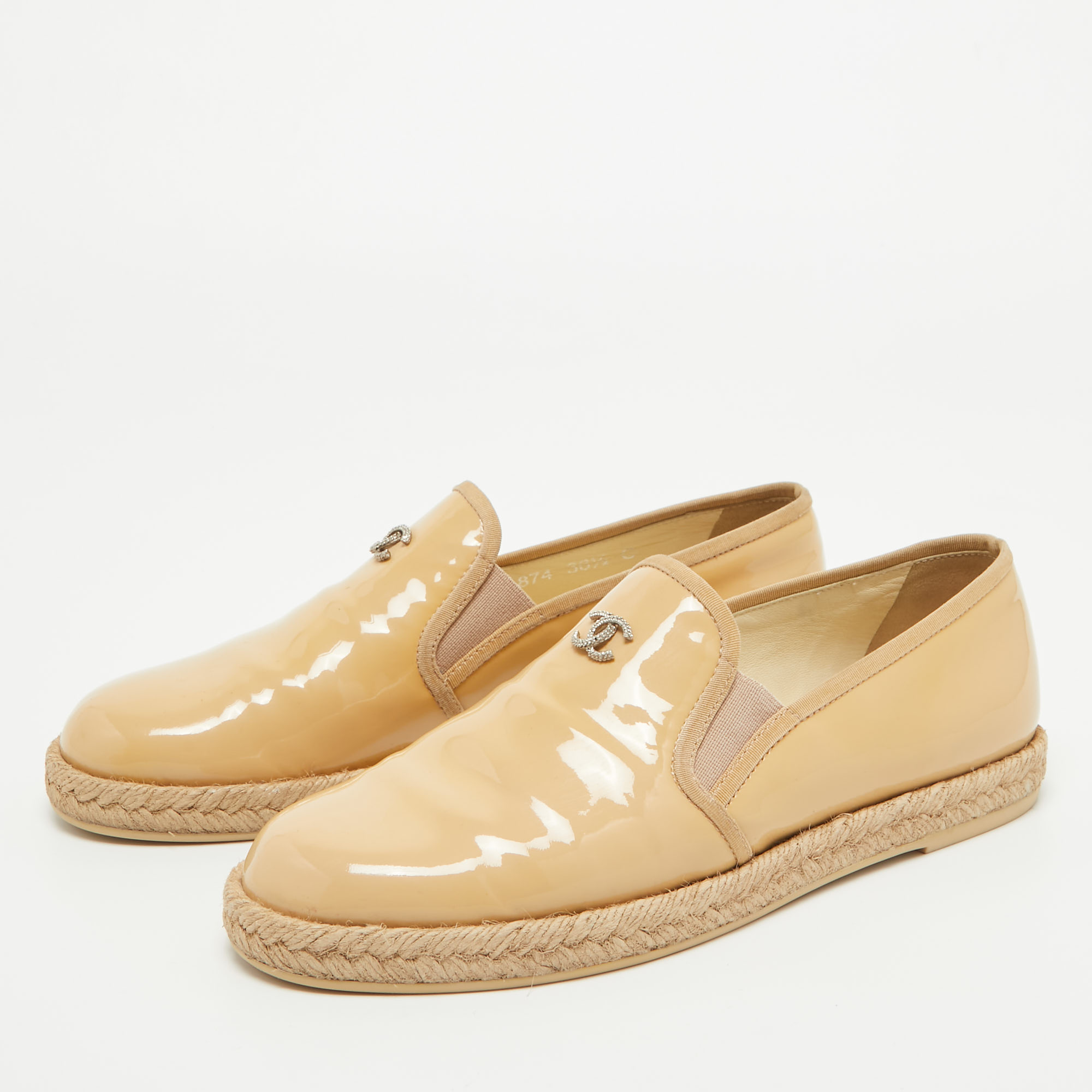 

Chanel Beige Patent Leather CC Espadrille Loafers Size