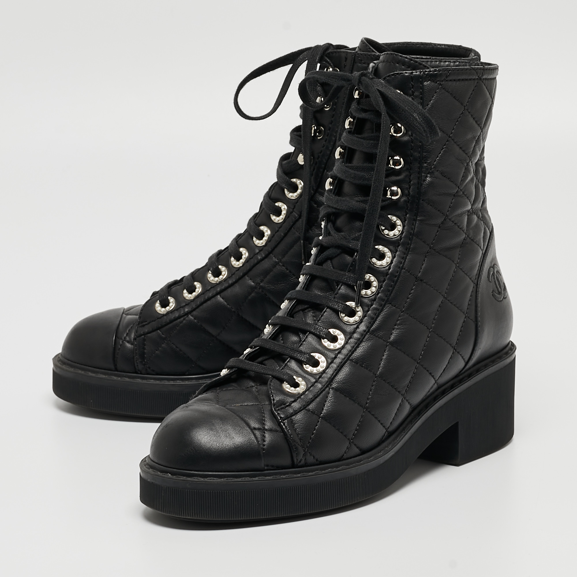 

Chanel Black Leather Quilted Leather CC Lace Up Boots Size
