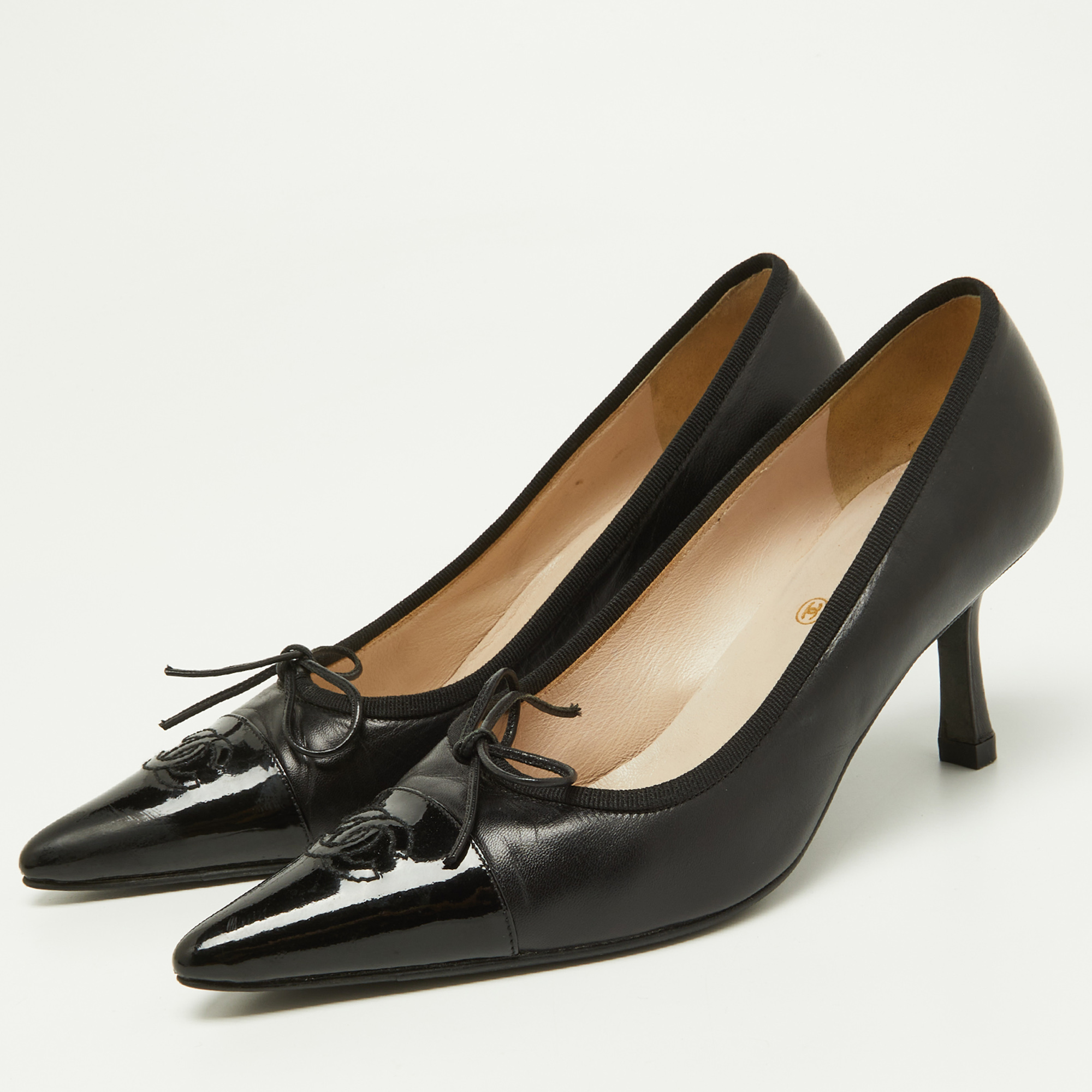

Chanel Black Leather and Patent Leather Bow CC Cap Toe Pumps Size