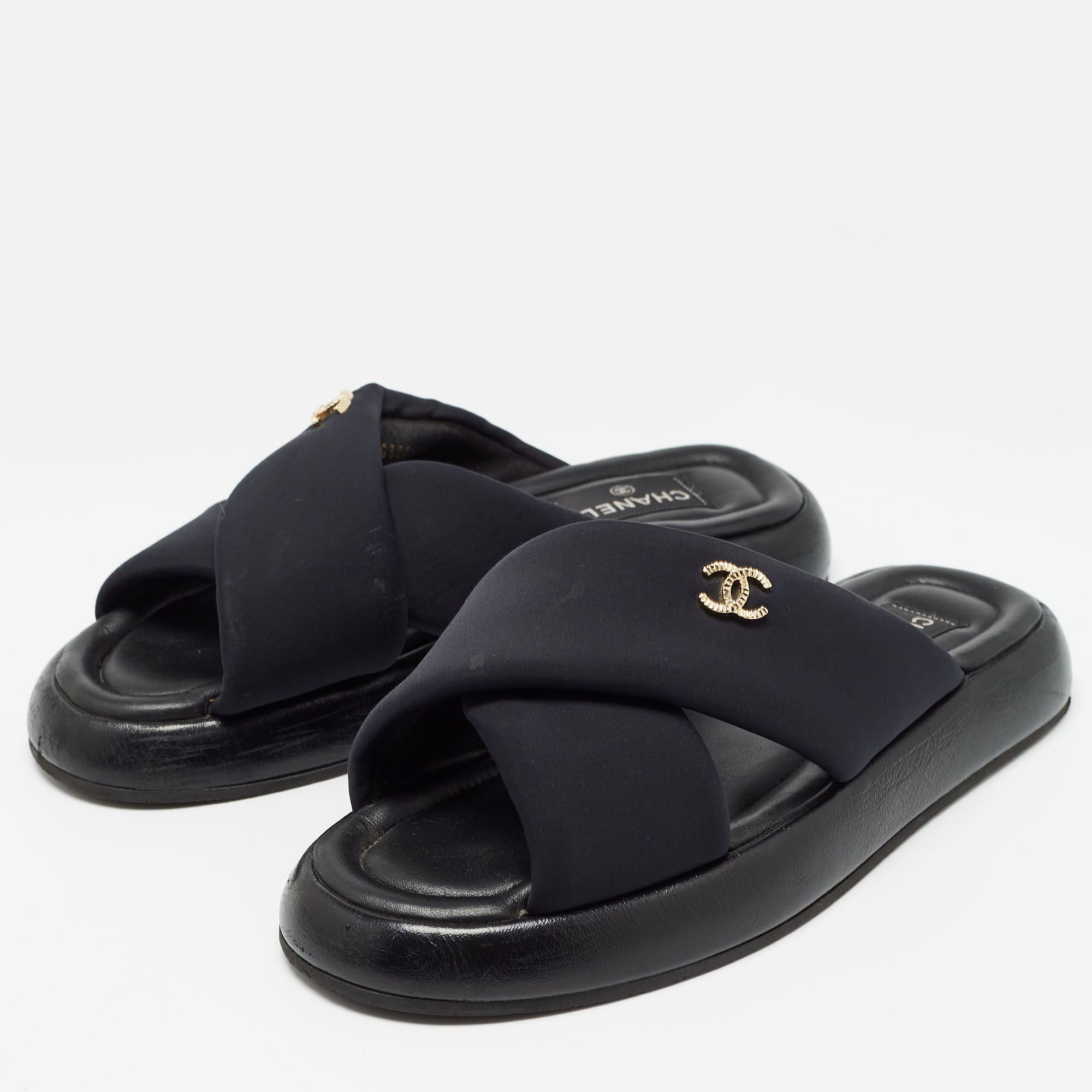 

Chanel Black Satin and Leather CC Puffy Criss Cross Slide Flats Size