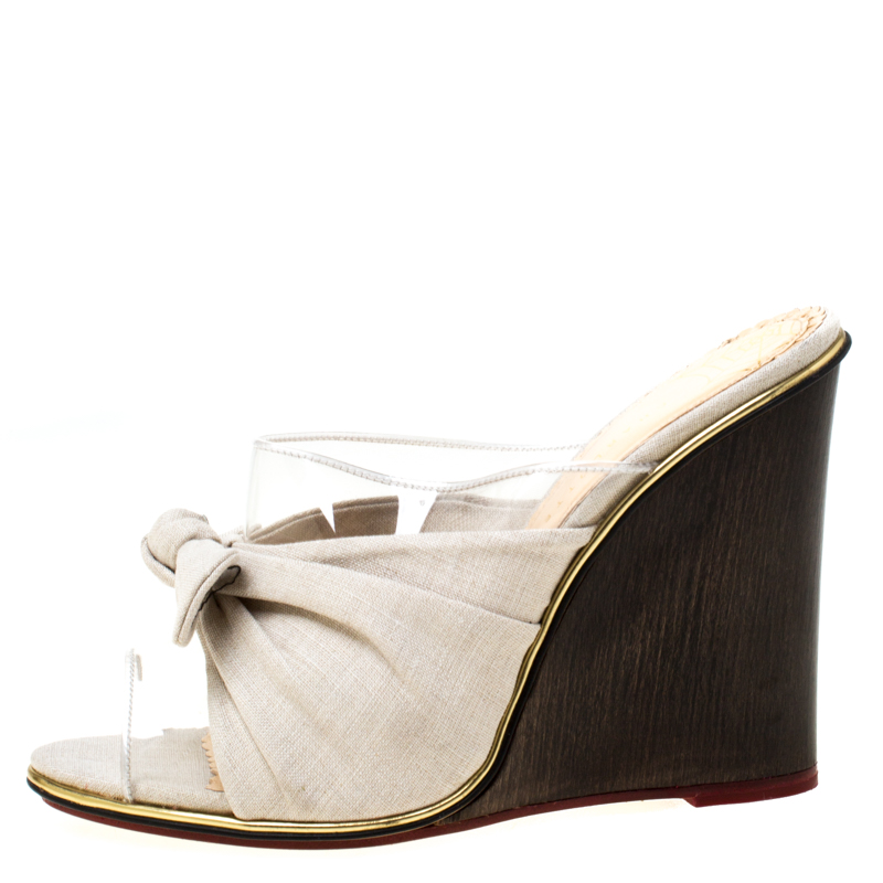 

Charlotte Olympia Grey Canvas And PVC Theresa Knot Detail Peep Toe Wedge Slides Size