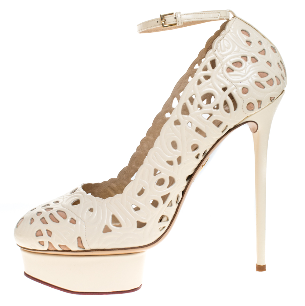 

Charlotte Olympia Cream Cut Out Leather Scribble Dolores Ankle Strap Platform Pumps Size