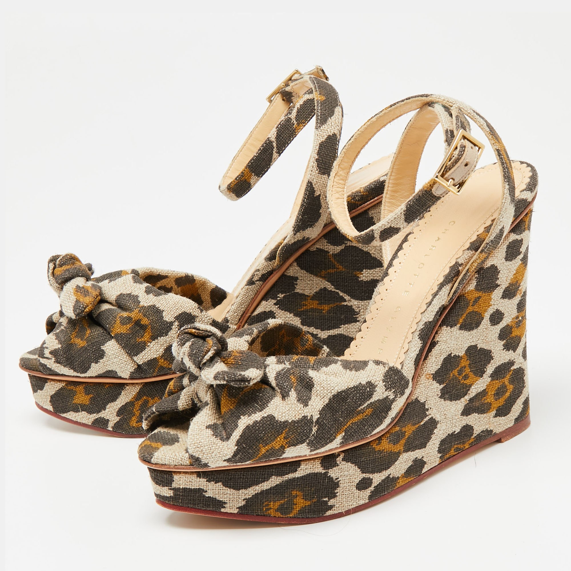 

Charlotte Olympia Brown/Beige Leopard Printed Canvas Bow Platform Ankle Strap Sandals Size