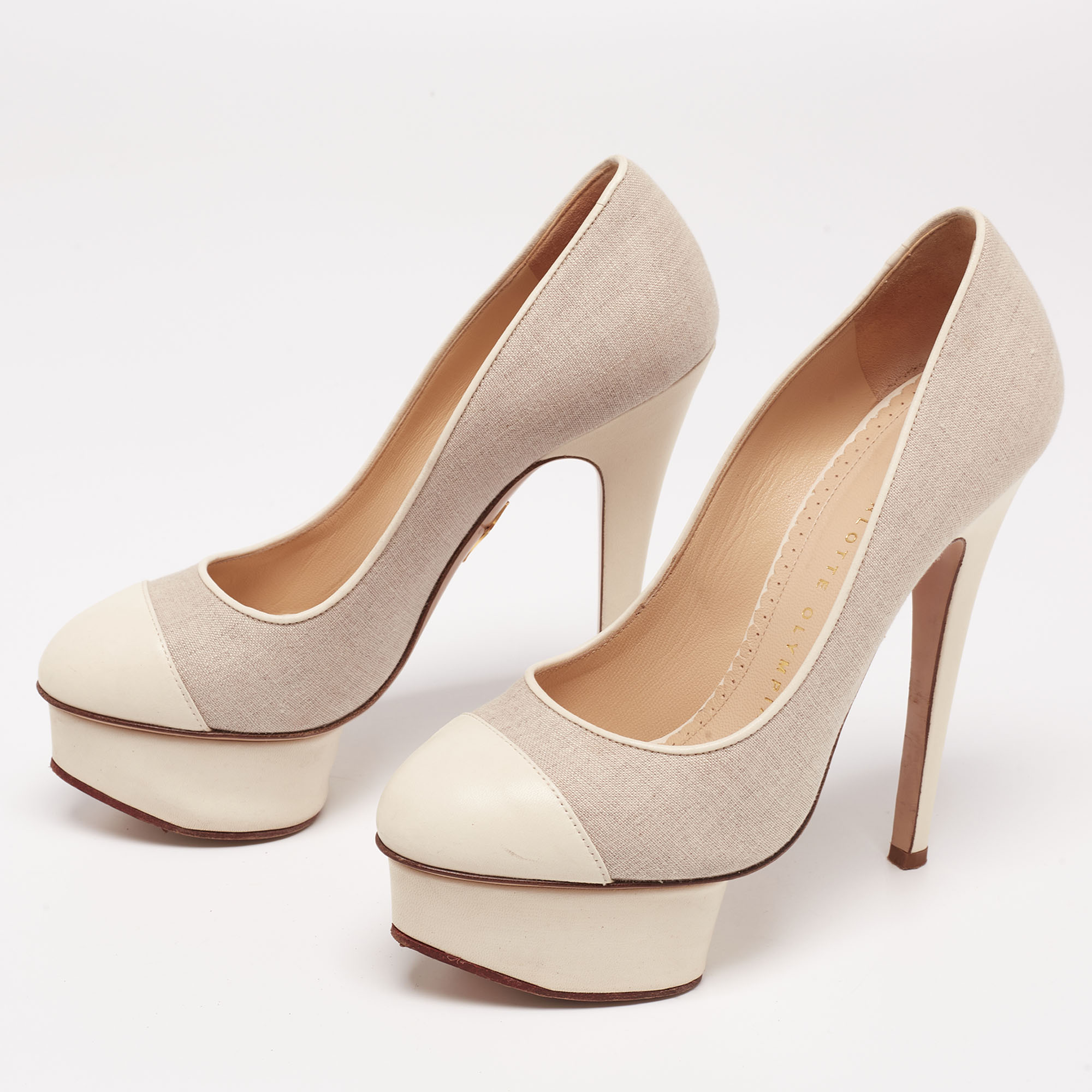 

Charlotte Olympia White Canvas and Leather Dolly Platform Pumps Size