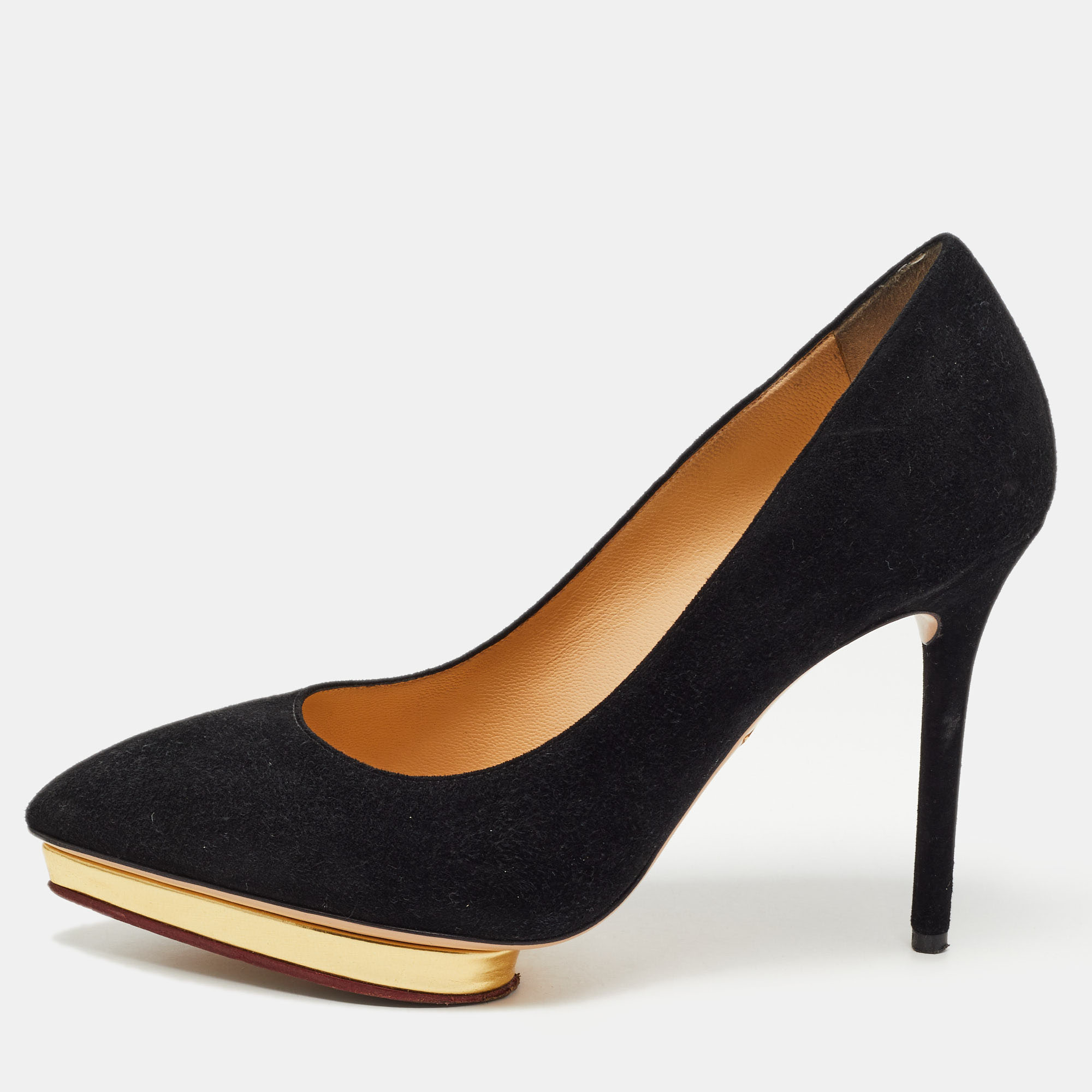 Bring home these Charlotte Olympia pumps today and get set to enjoy dazzling day outs Crafted out of suede in a classy black shade and lined with leather on the insoles this number is from their Dotty collection. Theyve been beautified with stiletto heels and gold toned platforms.