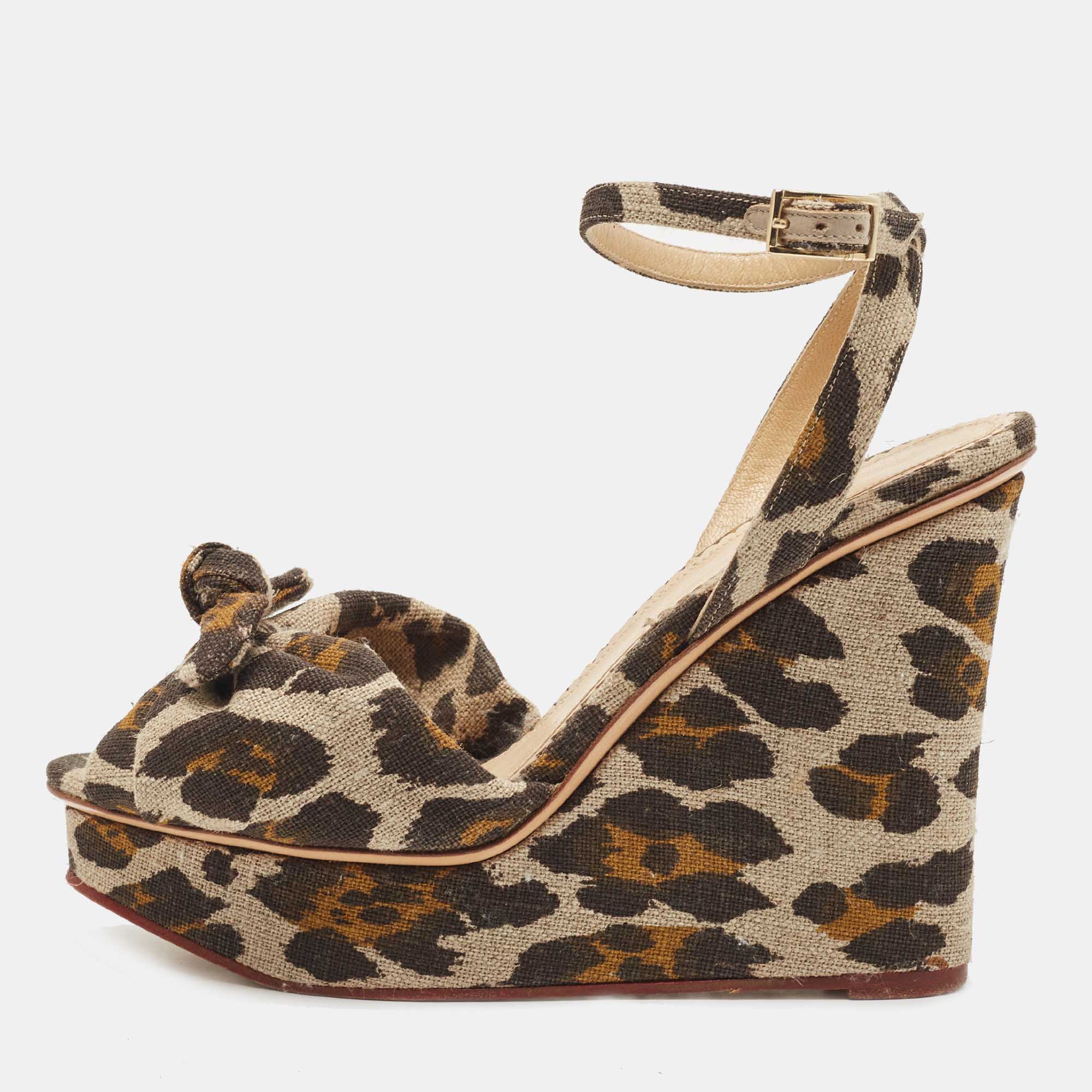 

Charlotte Olympia Beige/Brown Leopard Canvas Bow Platform Ankle Strap Wedge Sandals Size