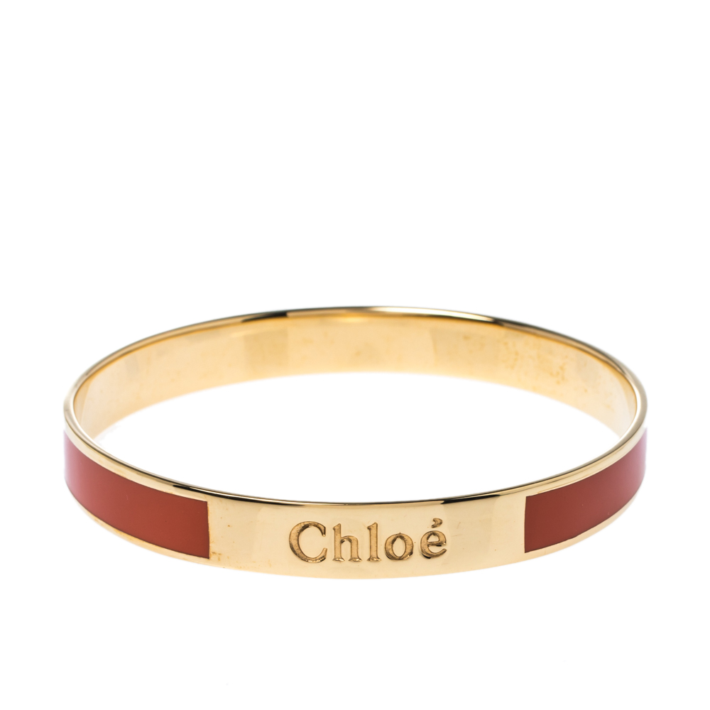 Pre Owned Chloé Orange Enamel Gold Tone Holly Bangle Bracelet