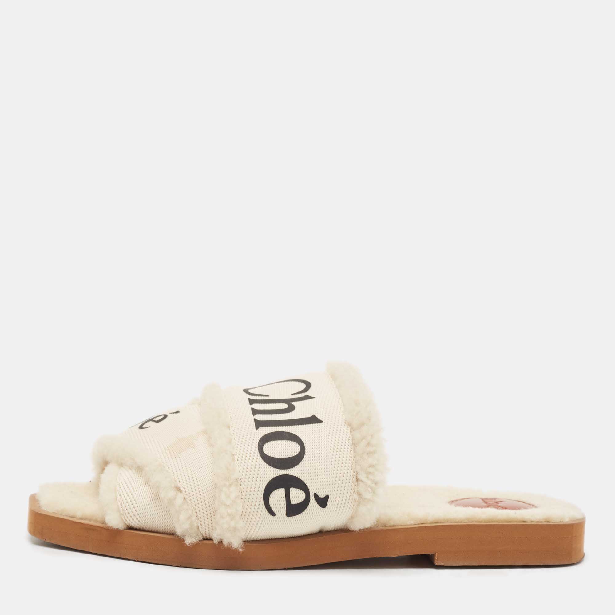 

Chloe White Canvas and Shearling Woody Flat Sandals Size