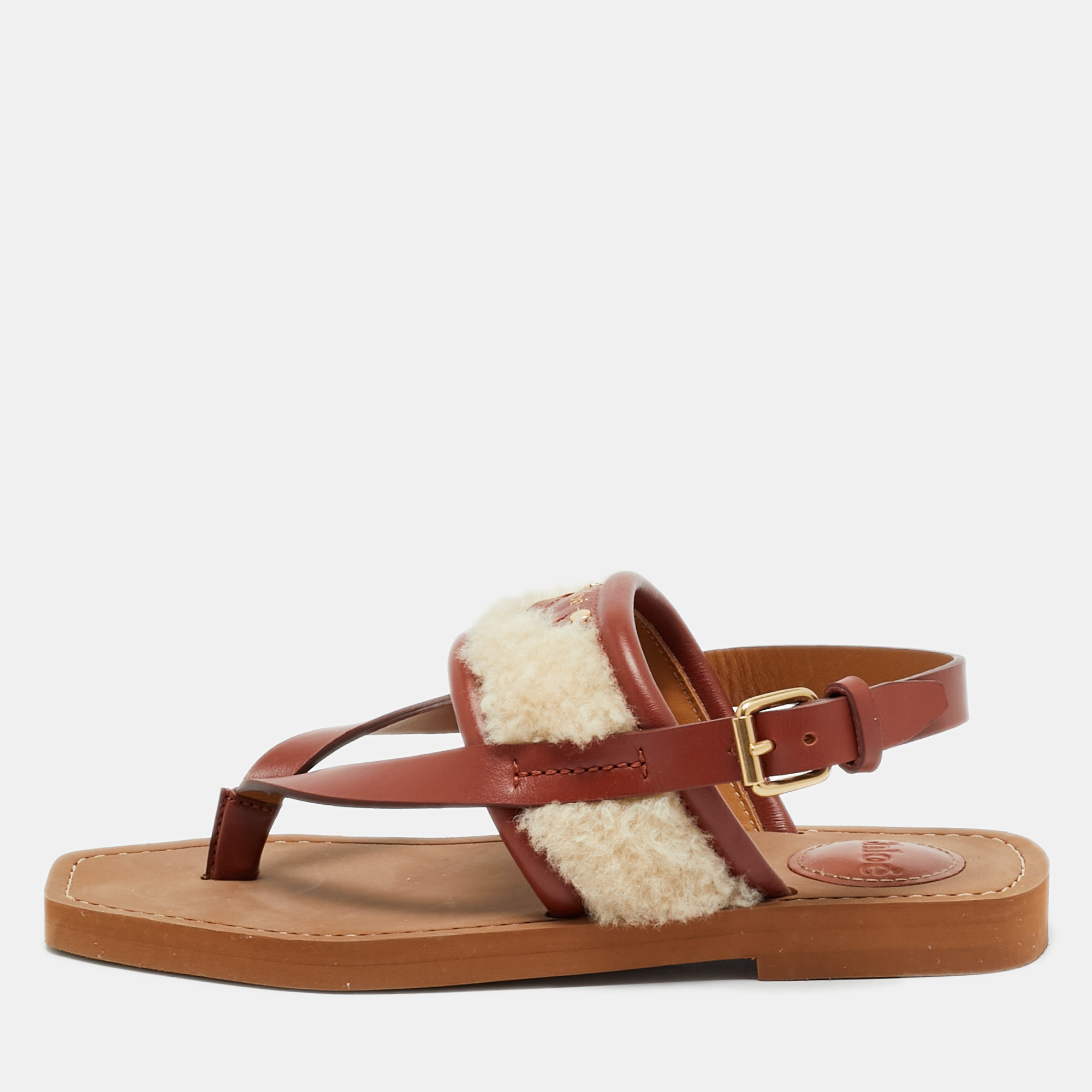 Click to view more detailed imagery on our partner's website Pre-owned Chloé Woody Size 36 Brown/beige Leather And Shearling Fur Thong Slingback Flat Sandals
