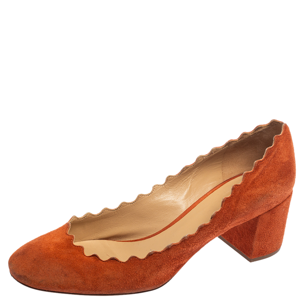 These pumps from the House of Chloe will amp up your trend quotient. They are created using orange suede on the exterior and feature rounded toes scallop trims and block heels. Look stylish and elegant as you step out in these Chloe pumps.
