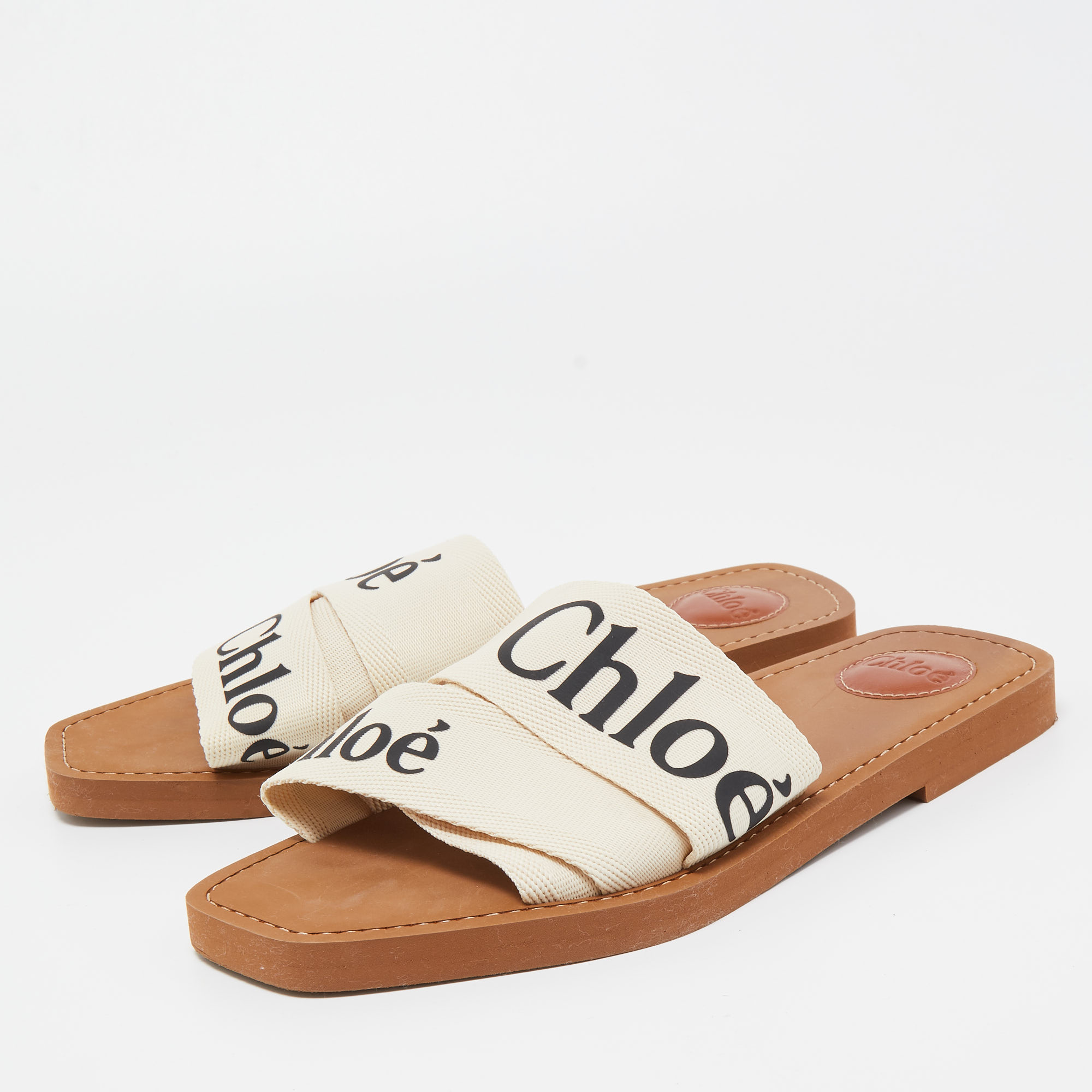 

Chloé Off-White Logo Canvas Woody Flat Slides Size