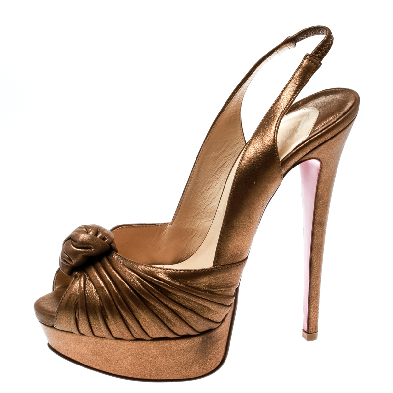 

Christian Louboutin Metallic Gold Leather Jenny Knotted Slingback Platform Sandals Size