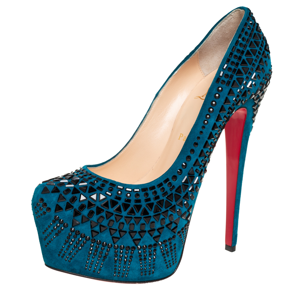 Make the streets your fashion runway in these gorgeous pumps from Christian Louboutin These blue pumps are crafted from suede and feature a pointed toe silhouette. They flaunt embellishments all over the exterior and come equipped with comfortable leather lined insoles 15.5 cm heels and platforms that offer maximum grip while walking. This is one pair you definitely cannot miss buying