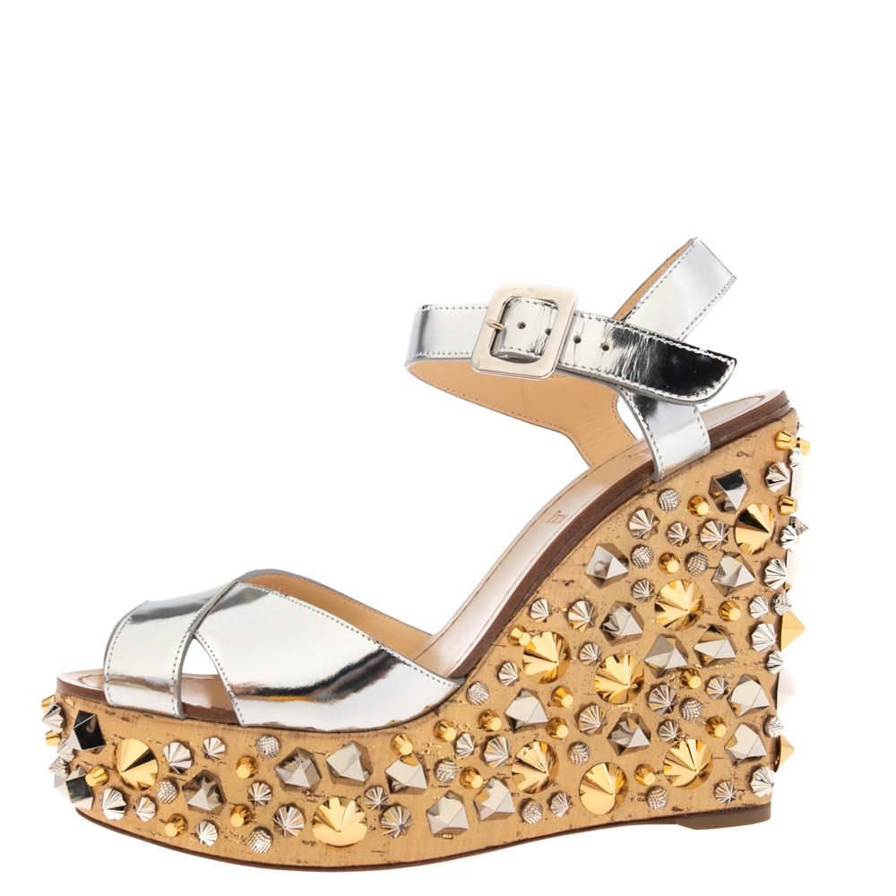 

Christian Louboutin Metallic Silver Leather And Fabric Studded Almeria Cork Wedge Sandals Size