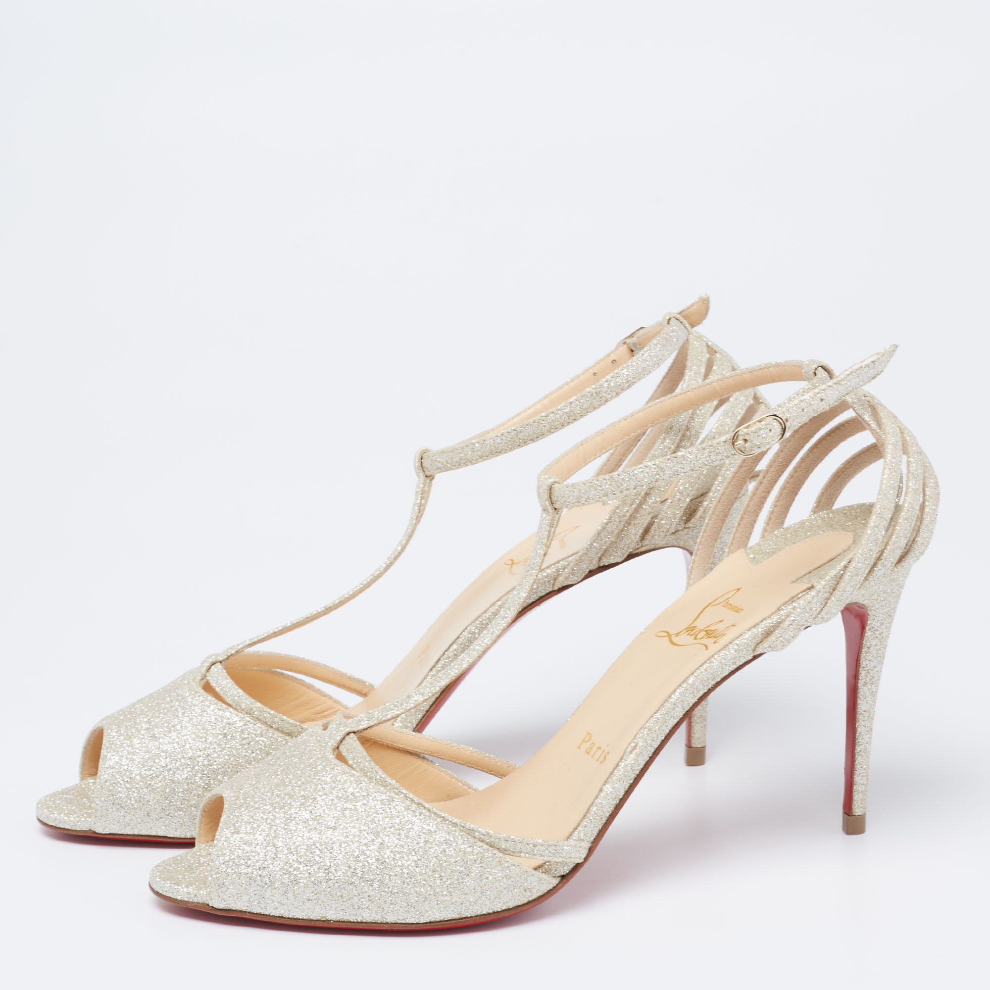 

Christian Louboutin Dull Gold Glitter Peep-Toe T-Bar Sandals Size