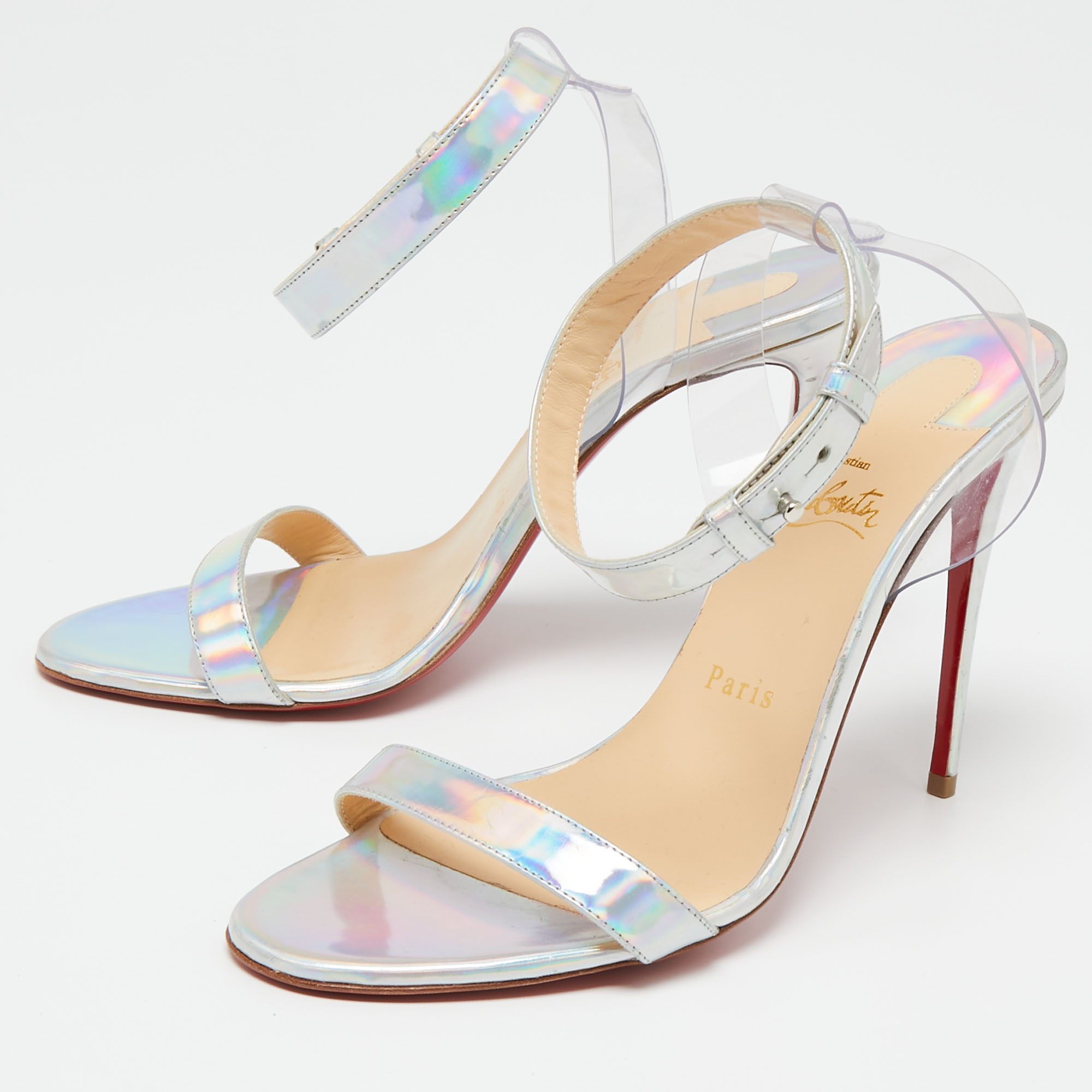

Christian Louboutin Multicolor Iridescent Leather and PVC Ankle-Strap Sandals Size