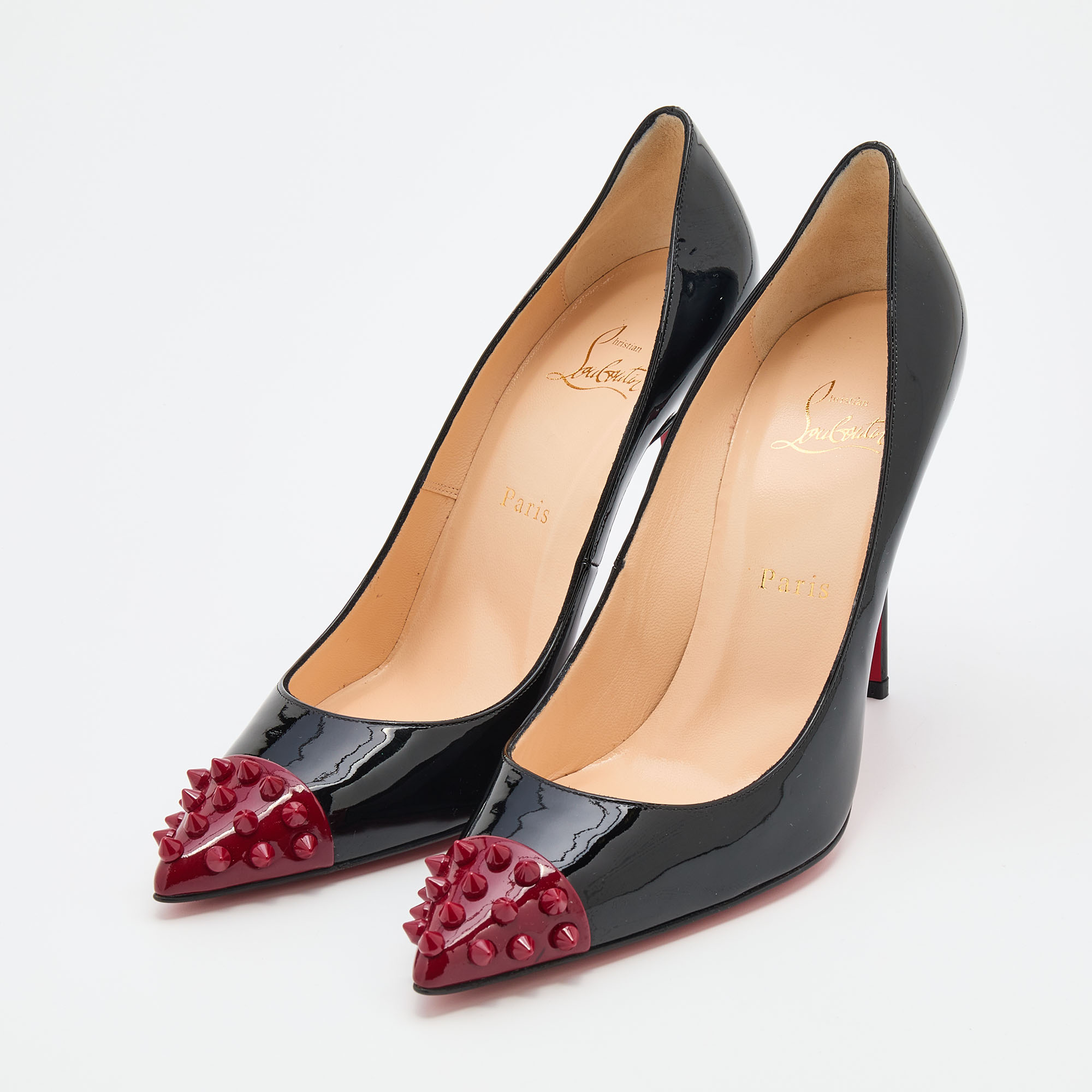 

Christian Louboutin Black/Red Patent Leather Geo Spiked Cap Toe Pumps Size