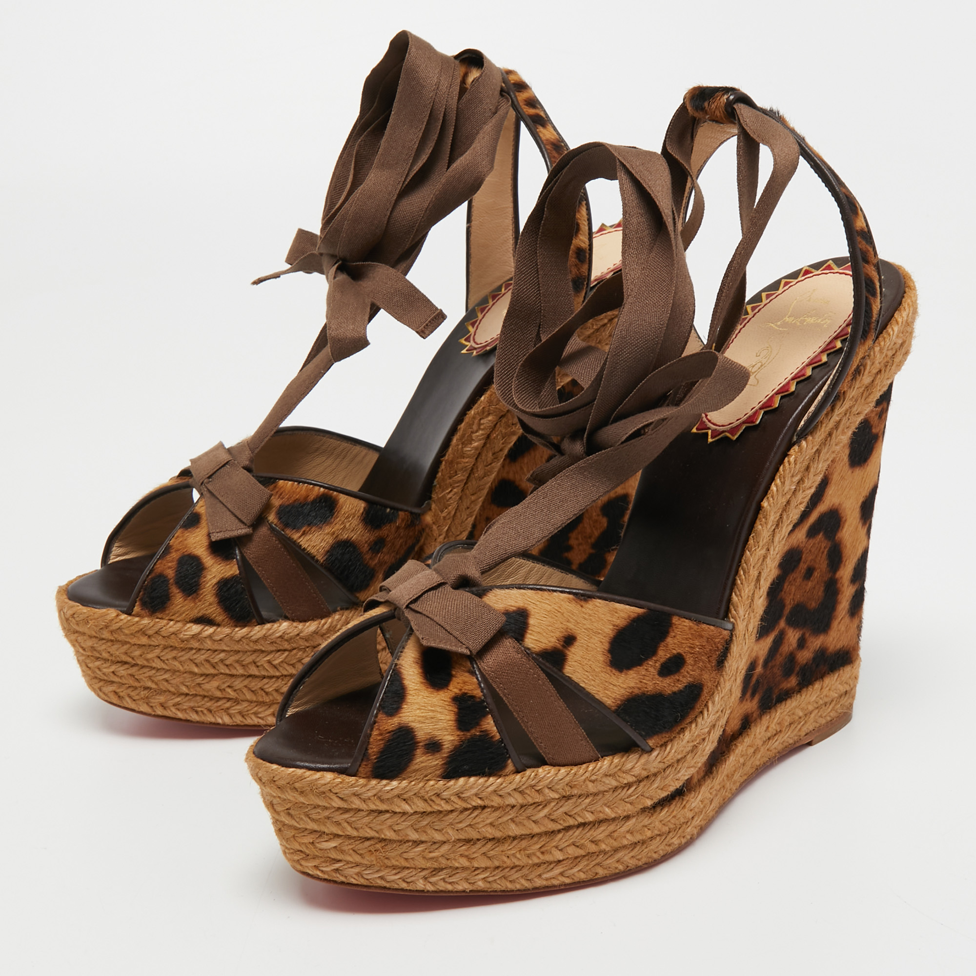 

Christian Louboutin Brown/Black Leopard Print Calf Hair and Fabric Isabelle Wedge Sandals Size