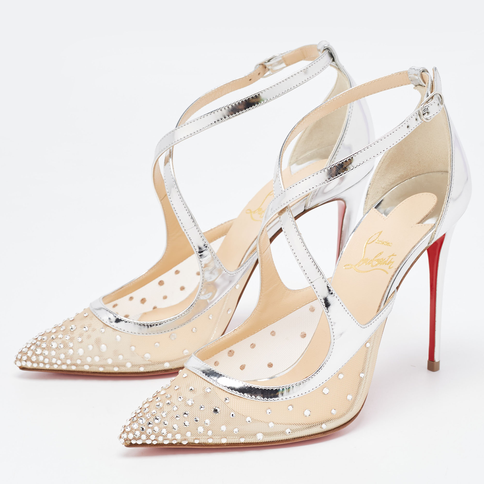 

Christian Louboutin Silver/Beige Mesh and Leather Twistissima Pumps Size