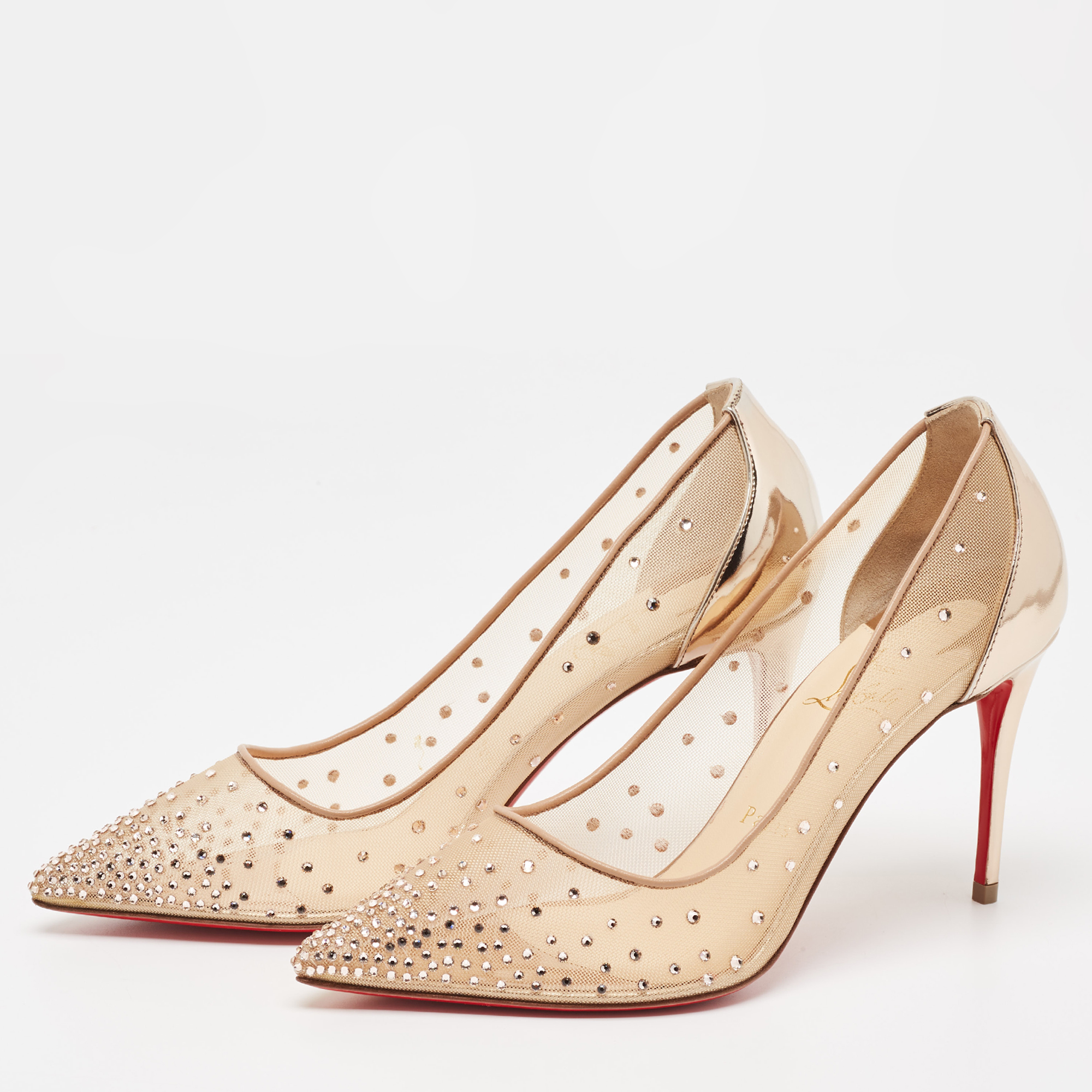 

Christian Louboutin Gold Mesh and Leather Follies Pumps Size