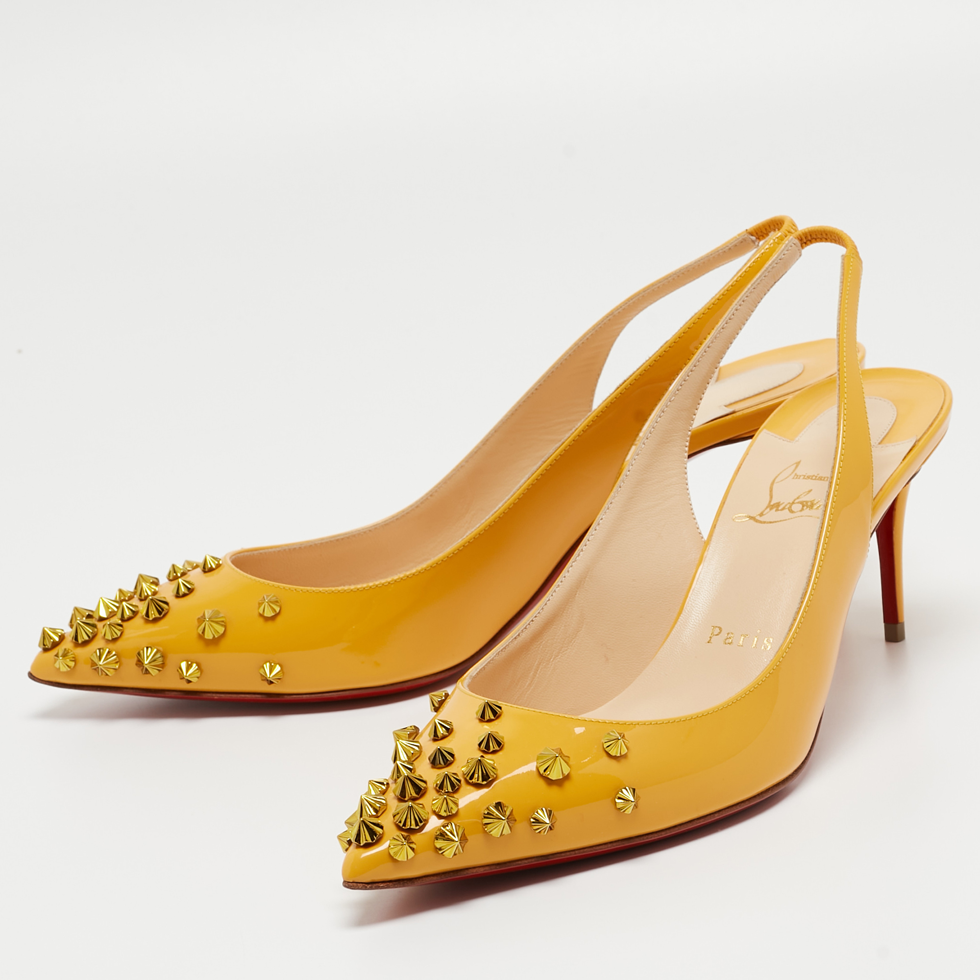 

Christian Louboutin Yellow Patent Drama Sing 100 Spike Slingback Pumps Size