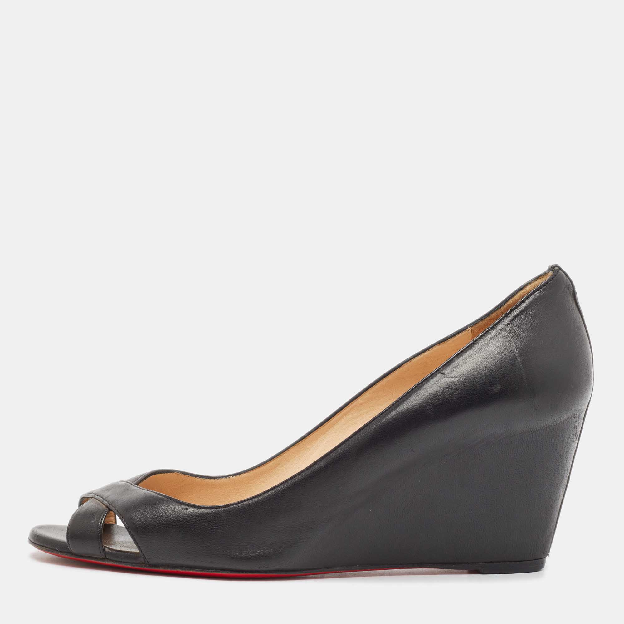 

Christian Louboutin Black Leather Riveto Wedge Pumps Size