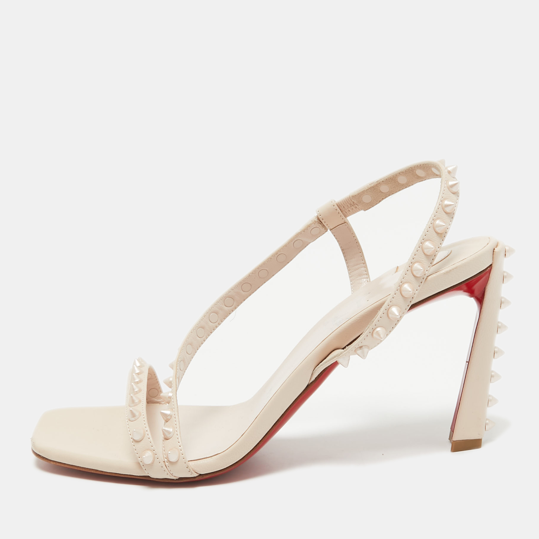 

Christian Louboutin Beige Leather Rosa Spike Ankle Strap Sandals