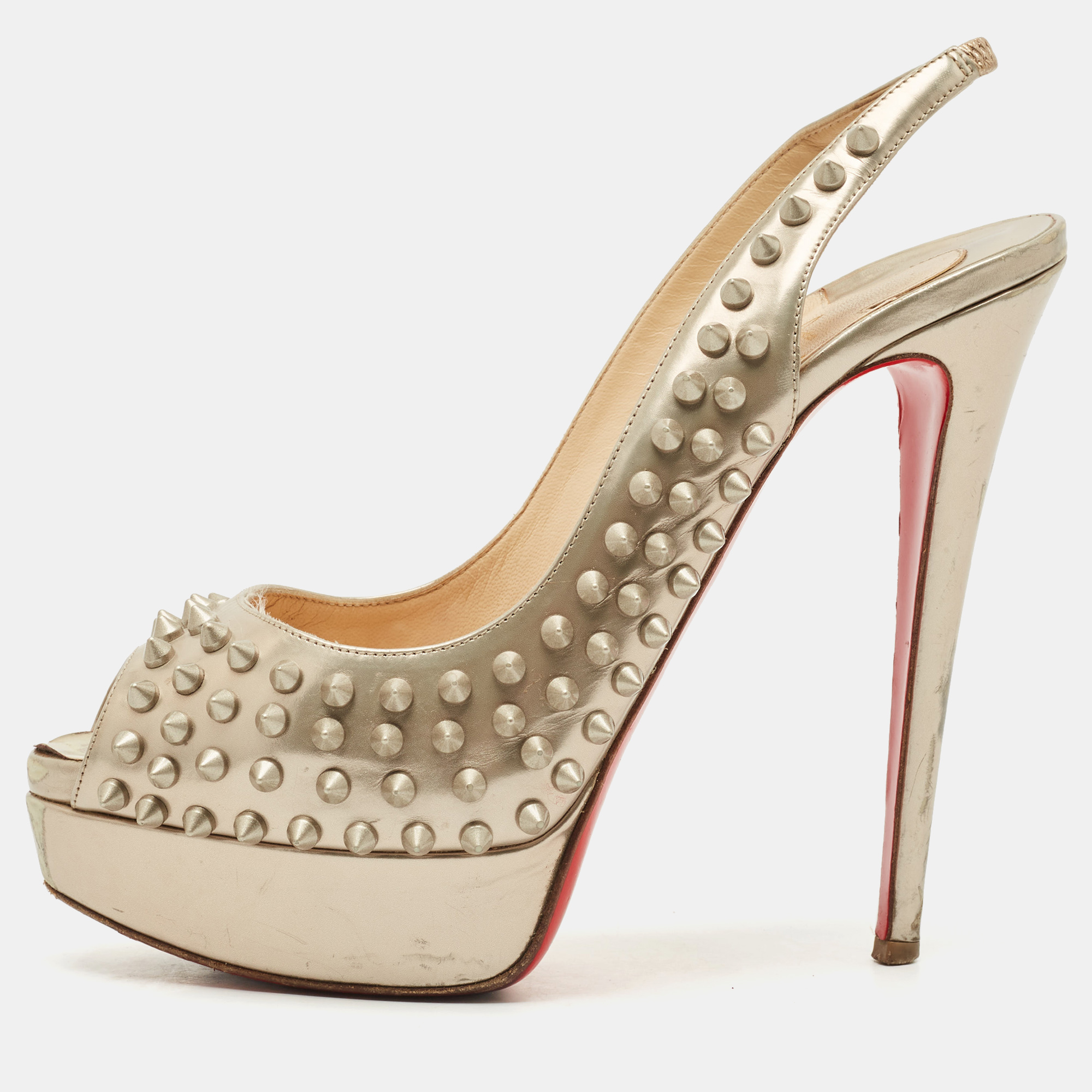 

Christian Louboutin Gold Leather Clou Noeud Platform Slingback Sandals Size