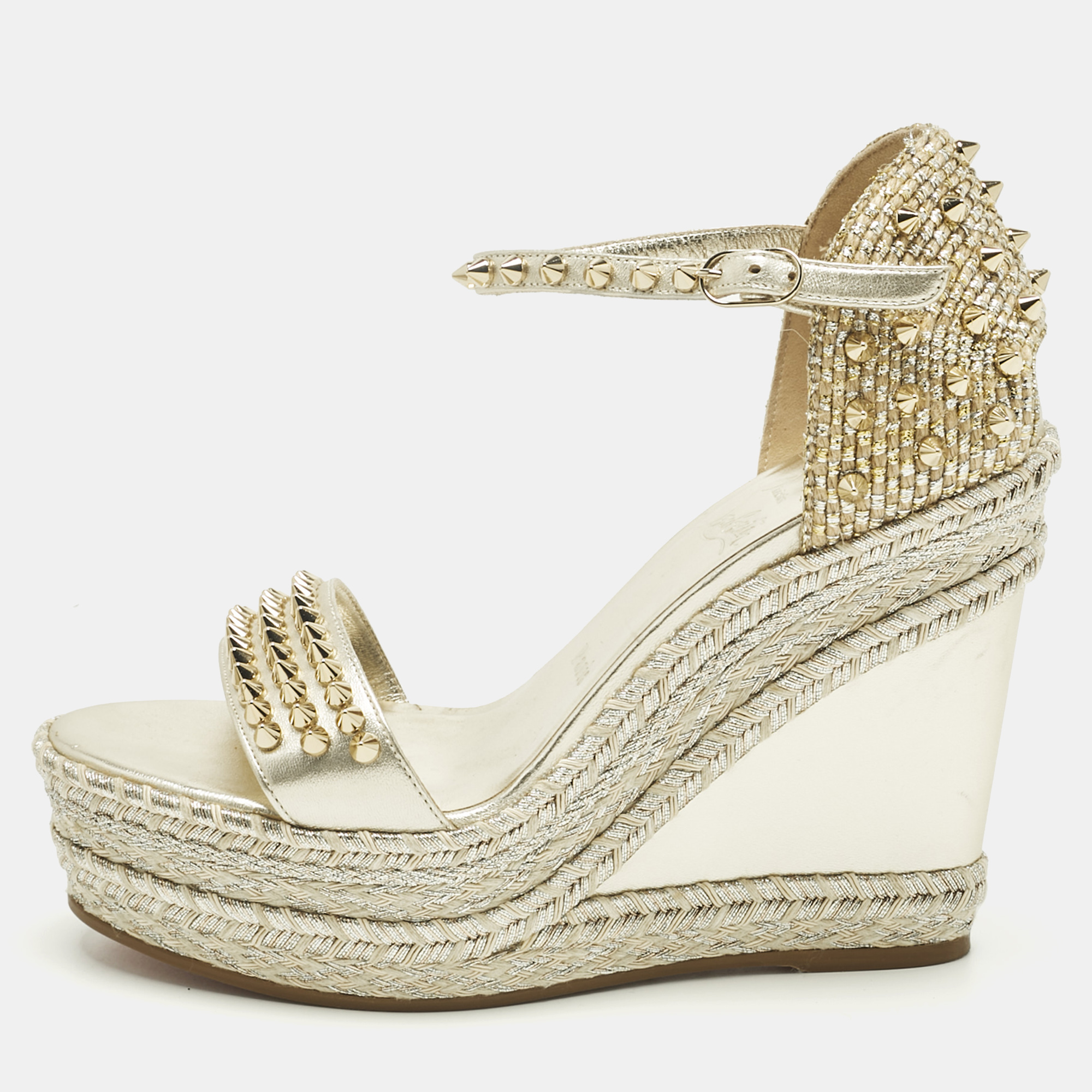 

Christian Louboutin Metallic Gold Leather and Raffia Madmonica Espadrille Sandals Size