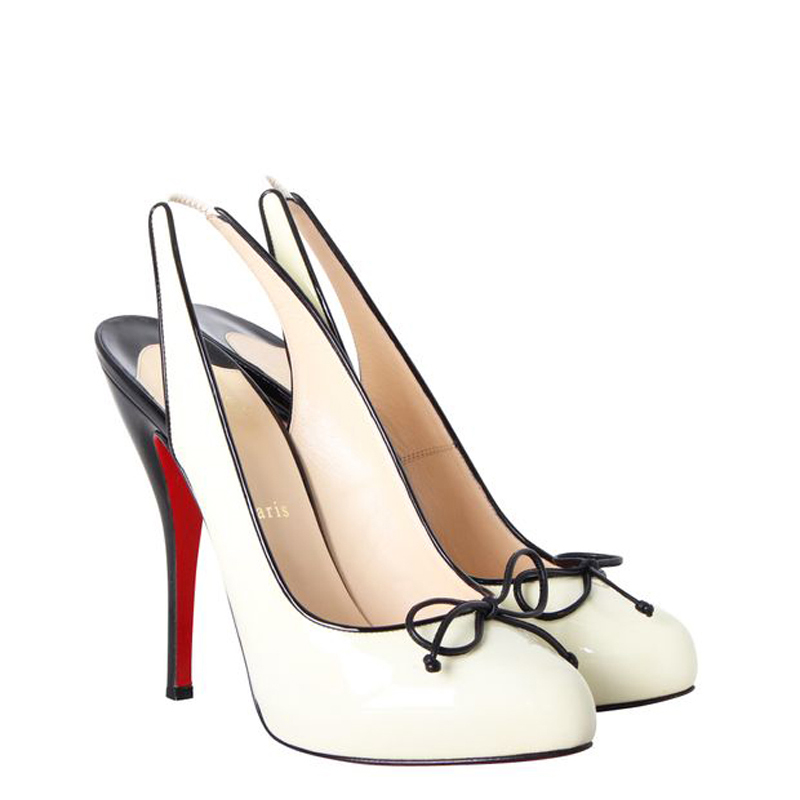 

Christian Louboutin Ivory/Black Captoe Bow Pumps Size