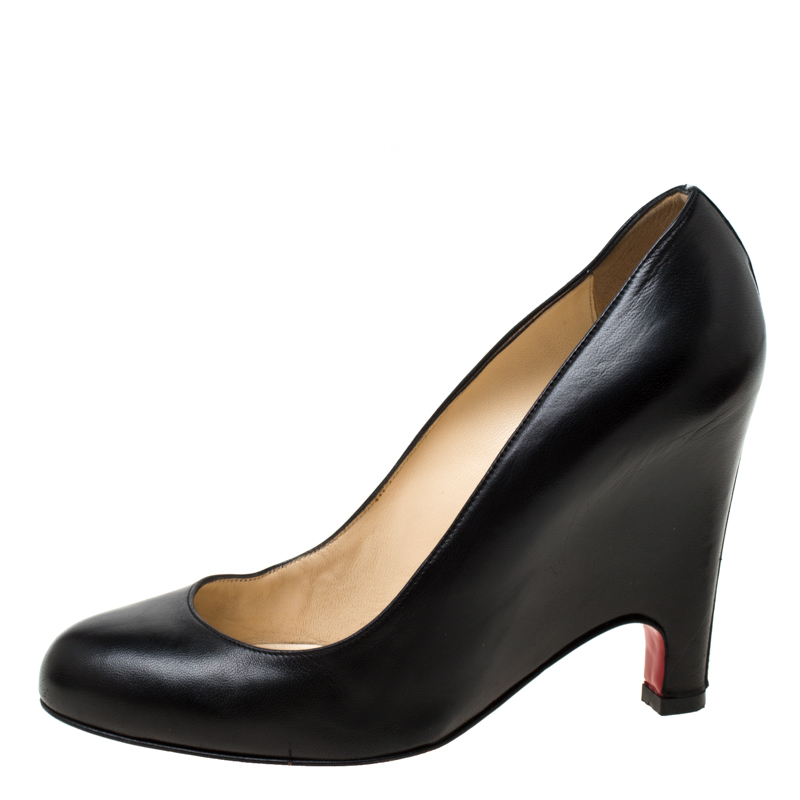 

Christian Louboutin Black Leather Wedge Pumps Size