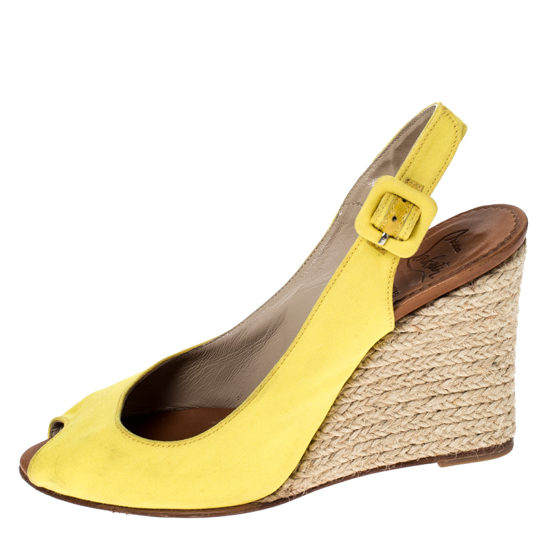 

Christian Louboutin Yellow Canvas Wedge Peep Toe Slingback Sandals Size