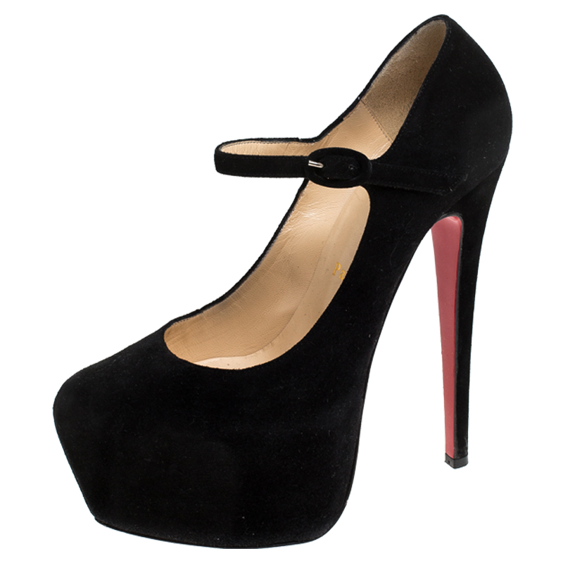 Take your love for Louboutins to new heights by adding this gorgeous pair to your collection. The pumps simply speak high fashion in every stitch and curve. The exterior comes made from suede and the pumps are finished with platforms 15.5 cm heels Mary Jane strap detail and the famous red soles.