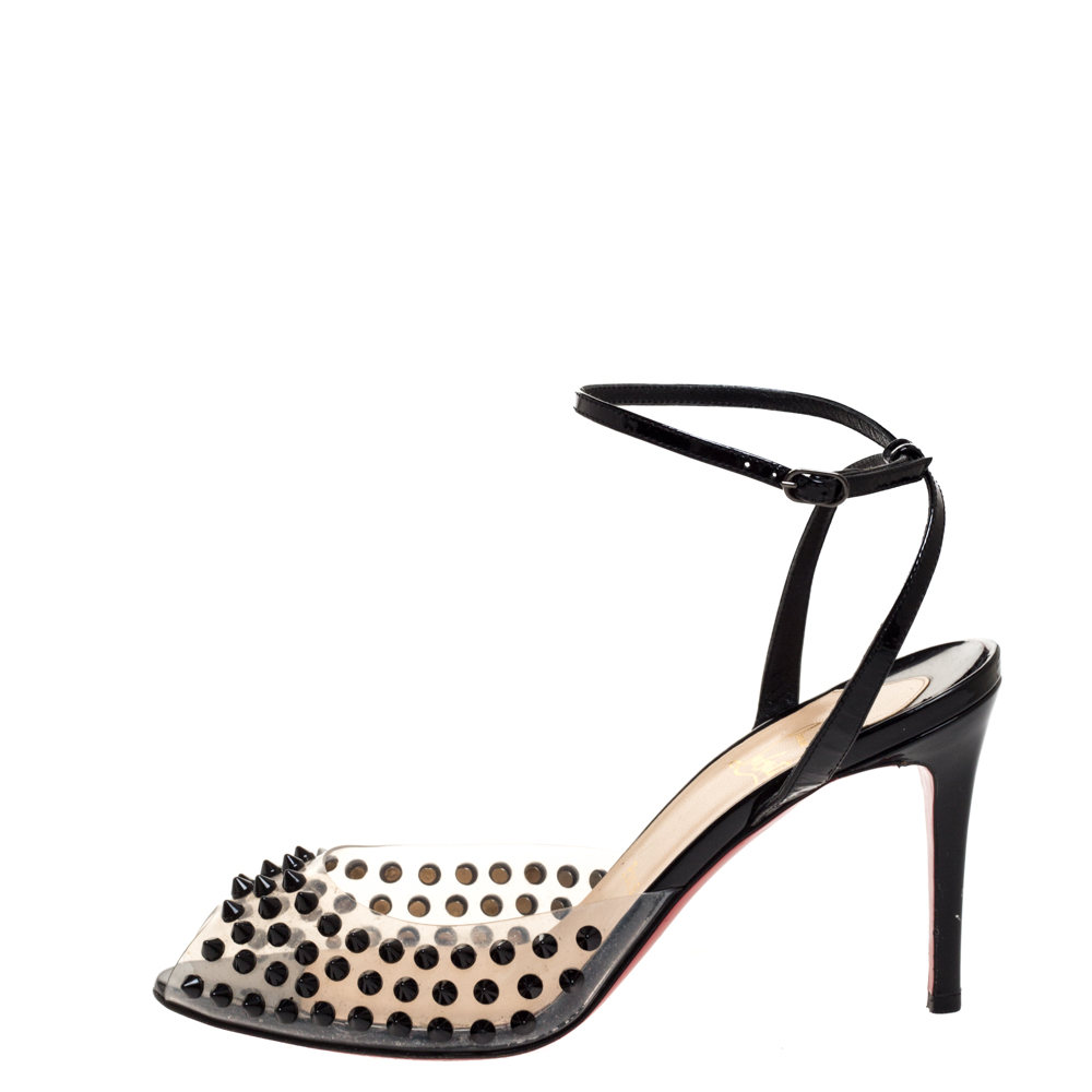 

Christian Louboutin Black Patent Leather and PVC Spiked Ankle Strap Sandals Size