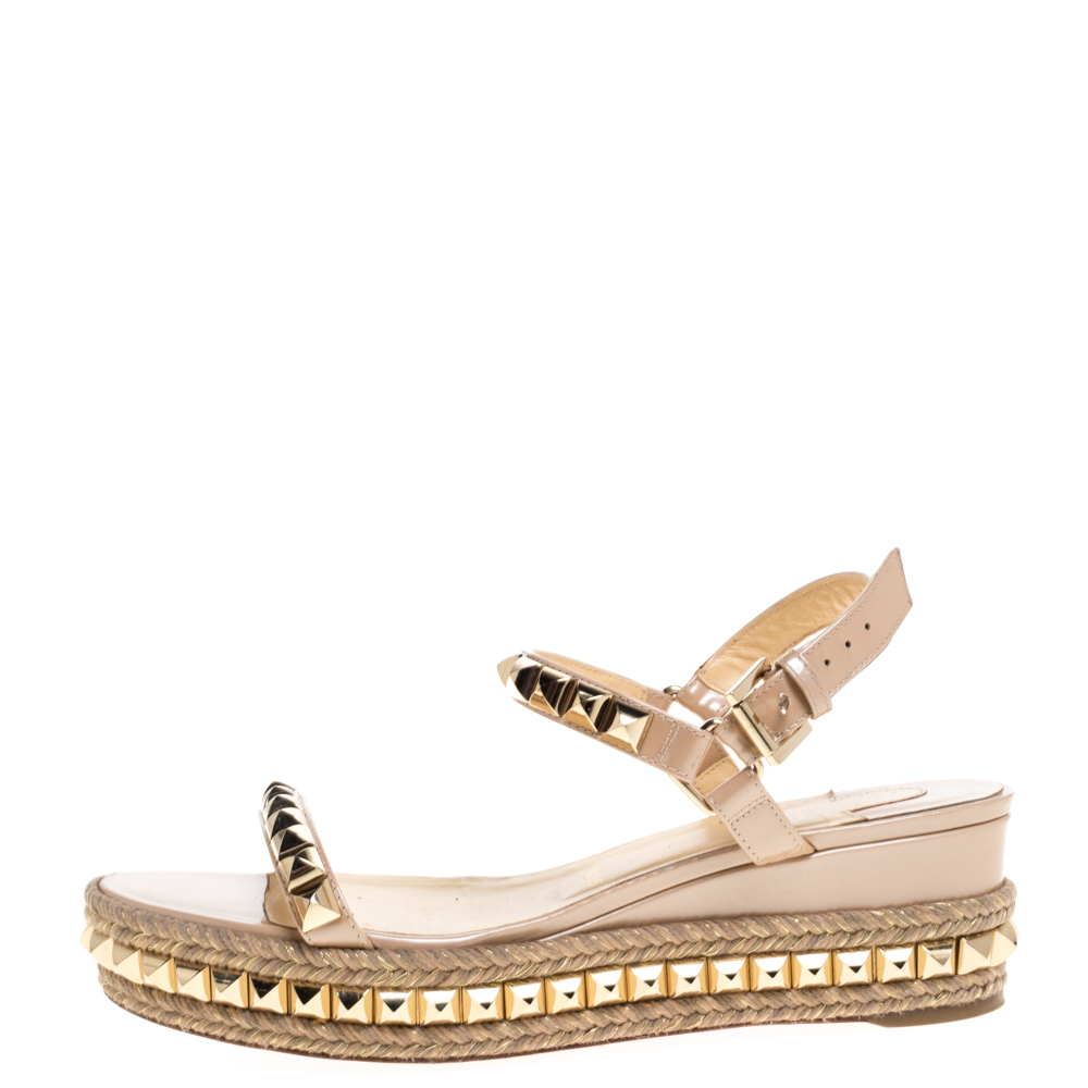 

Christian Louboutin Beige Patent And Gold Studded Leather Cataclou Espadrille Wedge Sandals Size
