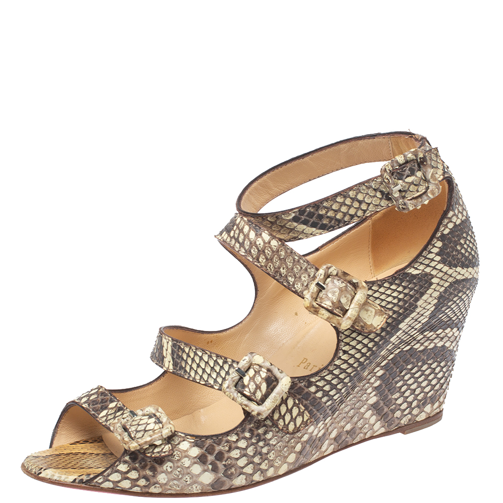

Christian Louboutin Beige Python Caged Buckle Wedge Sandals Size 38