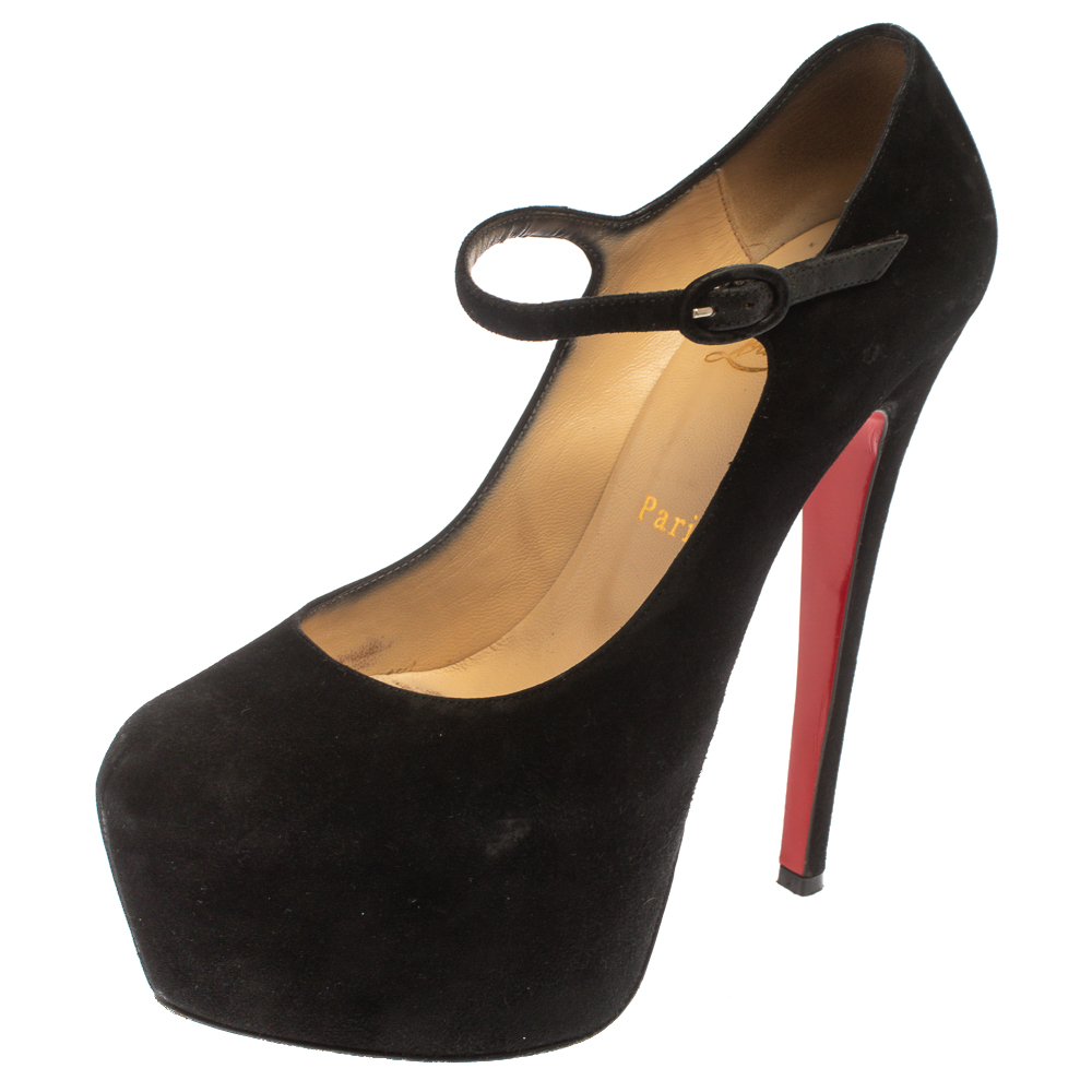 Take your love for Louboutins to new heights by adding this gorgeous pair to your collection. The pumps simply speak high fashion in every stitch and curve. The exteriors come made from suede in a mary jane style and the pumps are finished with platforms 15.5 cm heels and the famous red soles.