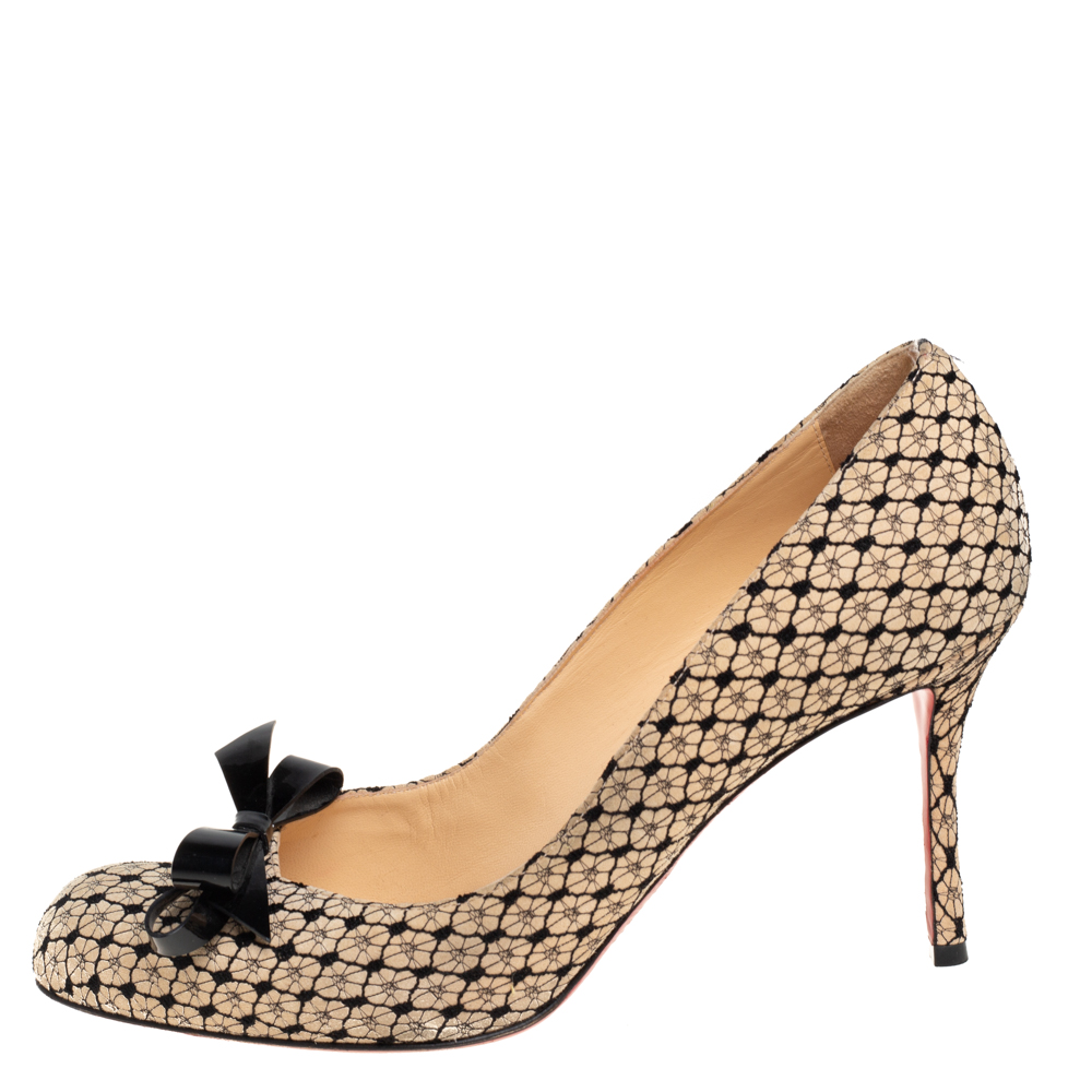 

Christian Louboutin Beige Suede and Lace Bow Pumps Size