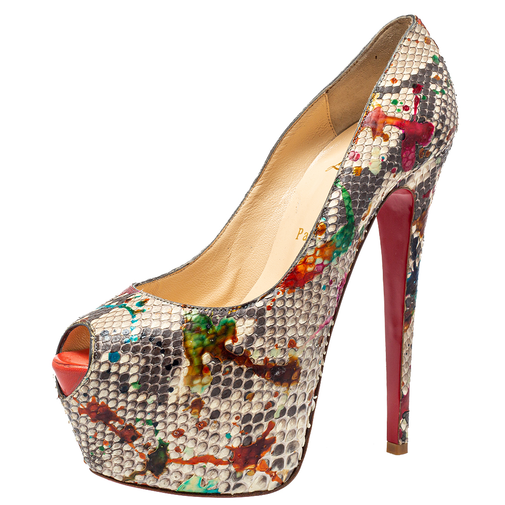 Strike a bold finish to your party outfit wearing these stunning Christian Louboutin Highness pumps. Crafted with multicolor python leather they feature an impressive peep toe silhouette. The leather lined insoles carry brand labeling and the pair is elevated on platforms and 16 cm heels. NOTE: AVAILABLE FOR UAE CUSTOMERS ONLY