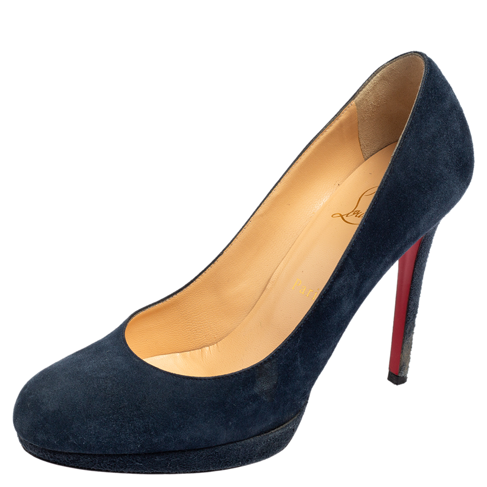 Escape the monotonous designs and move on to classy styles as these New Simple pumps from Christian Louboutin. They showcase a sleek silhouette crafted from blue suede and are finished with rounded toes platforms and pointy heels. Feel bold and confident as you step out wearing these delightful pumps.