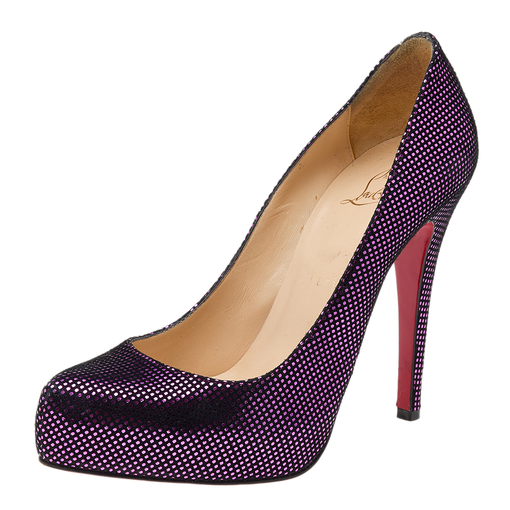Glamorous and appealing in every curve these Rolando pumps from the House of Christian Louboutin will incorporate a luxe edge to your feet. They are made from metallic purple suede on the exterior and feature rounded toes platforms and 11.5 cm heels. They are lined with the signature red soles.
