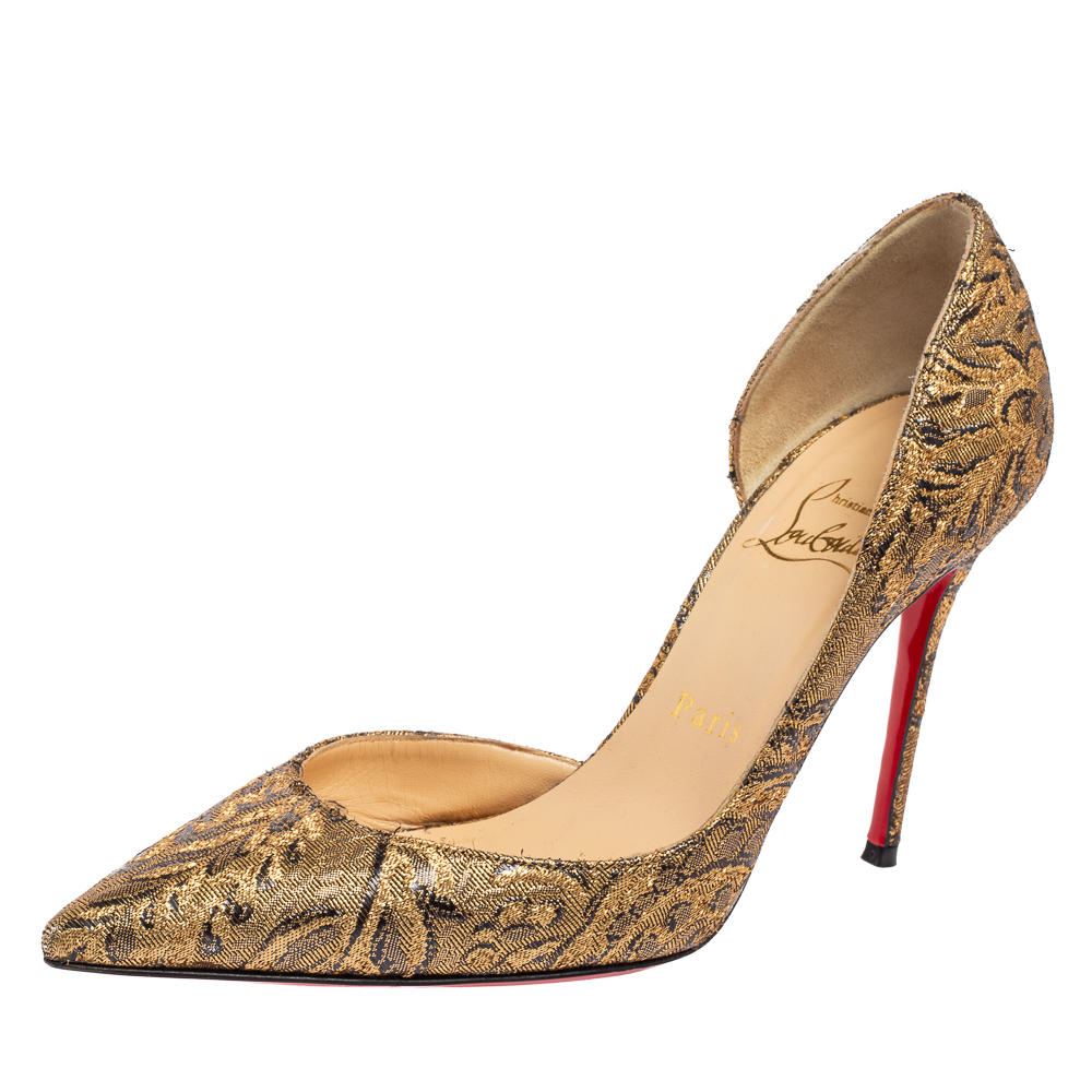 Skilfully crafted from brocade fabric in a Dorsay style with pointed toes these Christian Louboutin pumps come ready to give you a high fashion experience. The rich gold pumps with sharp cut toplines are balanced on 10 cm heels and finished with comfortable insoles. Envision yourself slipping into them and rest assured that theyll bring out the best in you.