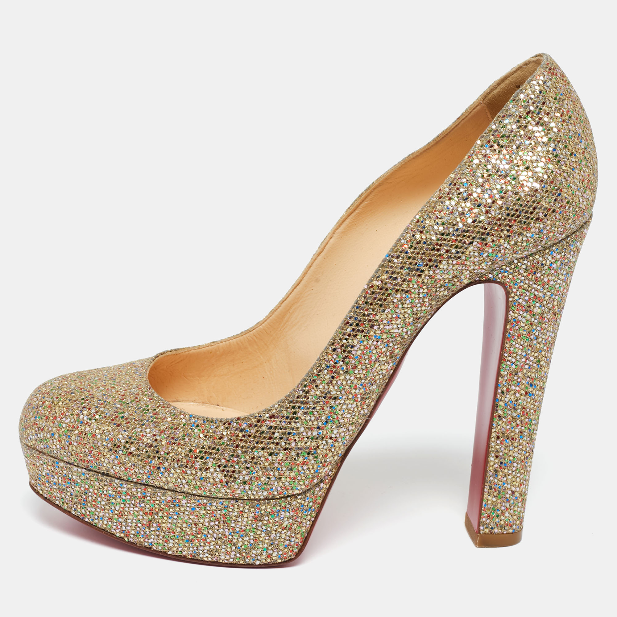 Feel glamorous every time you slip into this glitzy pair by Christian Louboutin. Covered in gold glitter and balanced on platforms and 12.5 cm heels these pumps will be a winner with all your well tailored outfits. They are finished with the signature red on the soles.