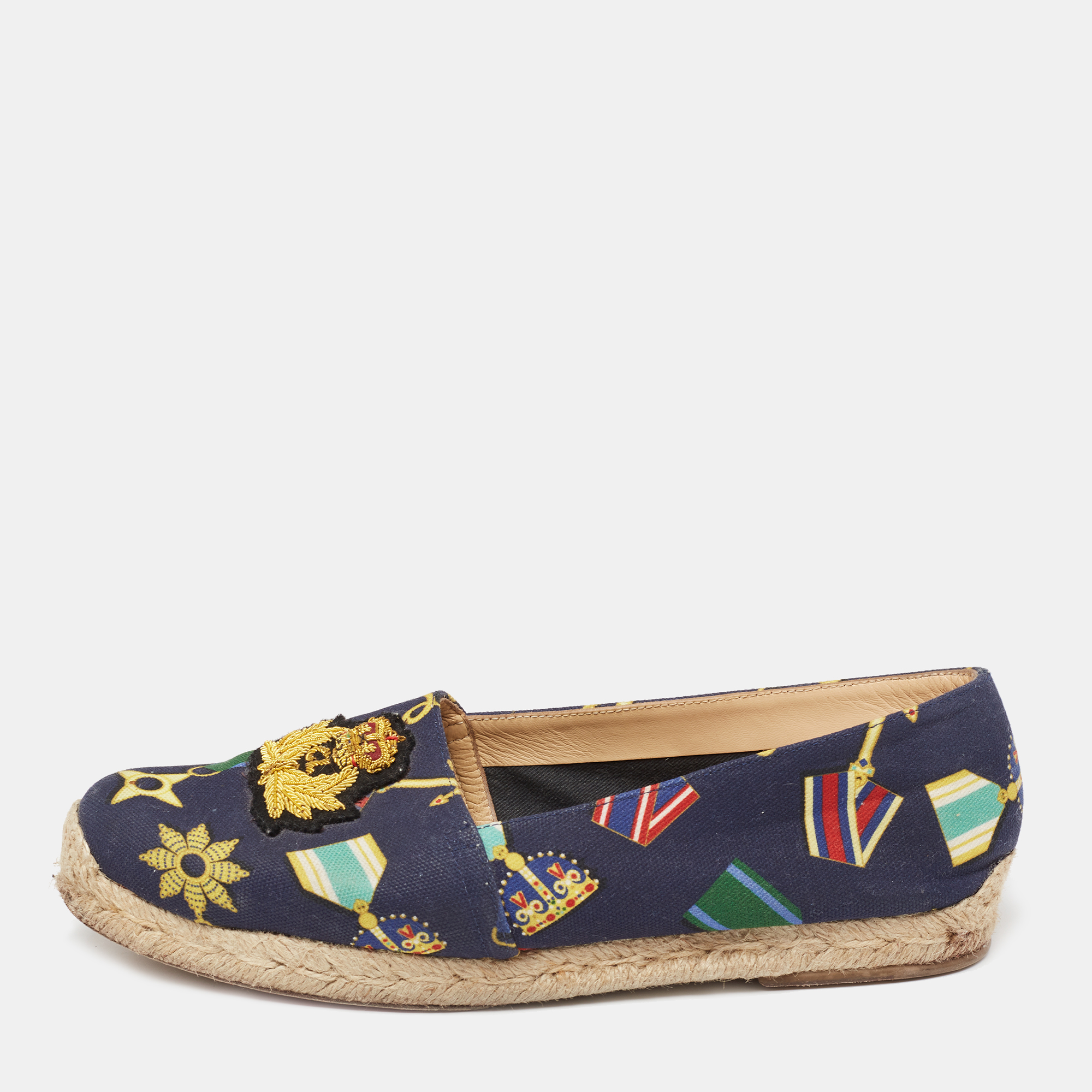 Add a dose of fun and drama to your looks with these Galia espadrille flats from the house of Christian Louboutin. It features a versatile medal printed canvas body and embroidered detailing on the vamps. Style with summer dresses or boyfriend jeans this pair is sure to make a statement