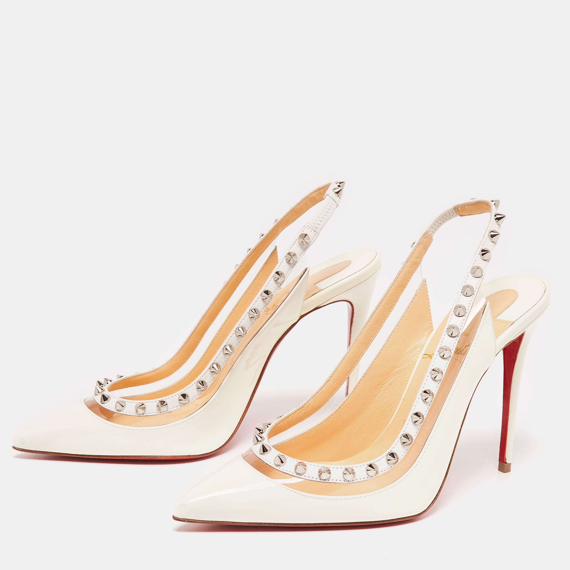 

Christian Louboutin White Patent Leather and PVC Brigandine Spike Slingback Pumps Size