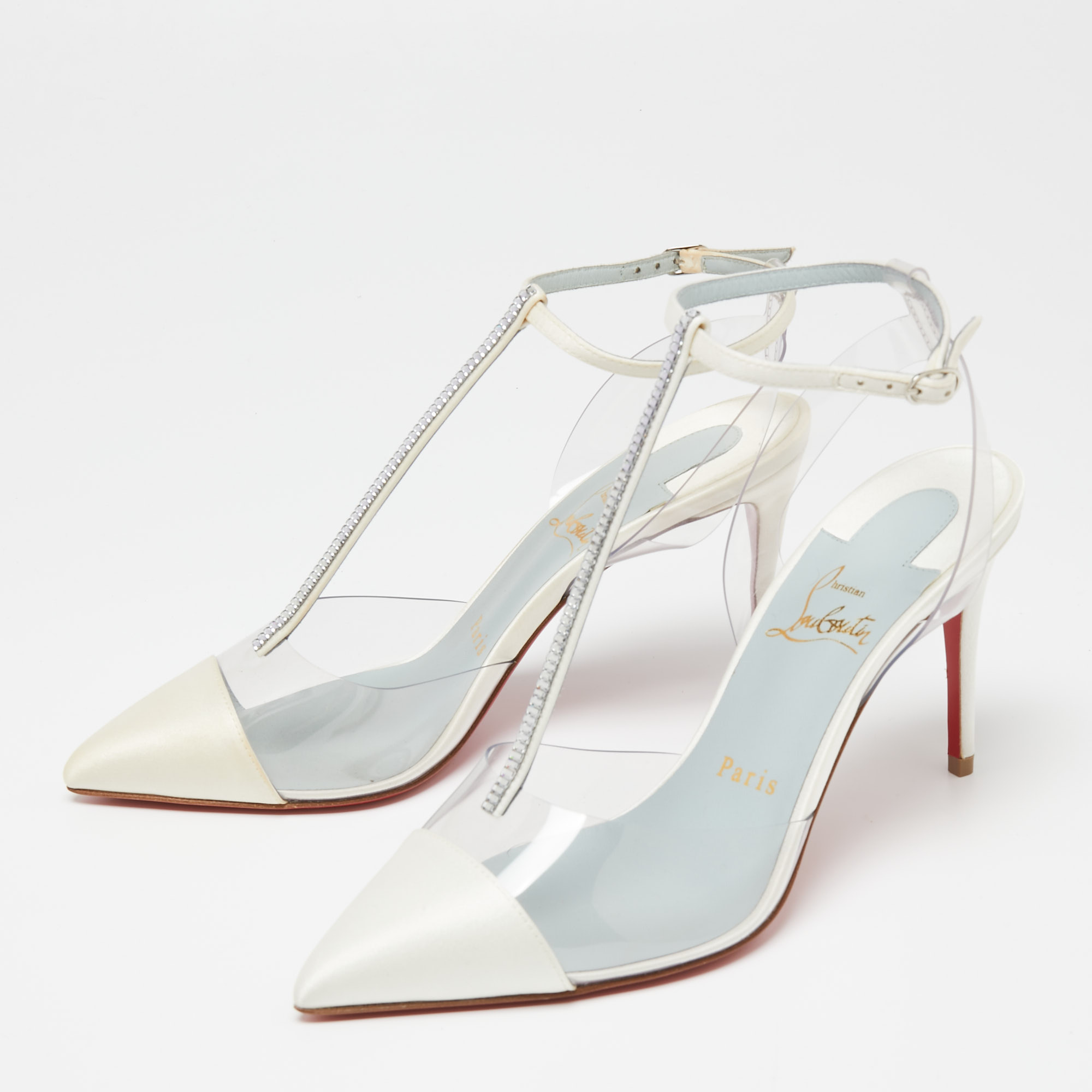 

Christian Louboutin Ivory Satin and PVC Nosy T-Strap Pumps Size, White