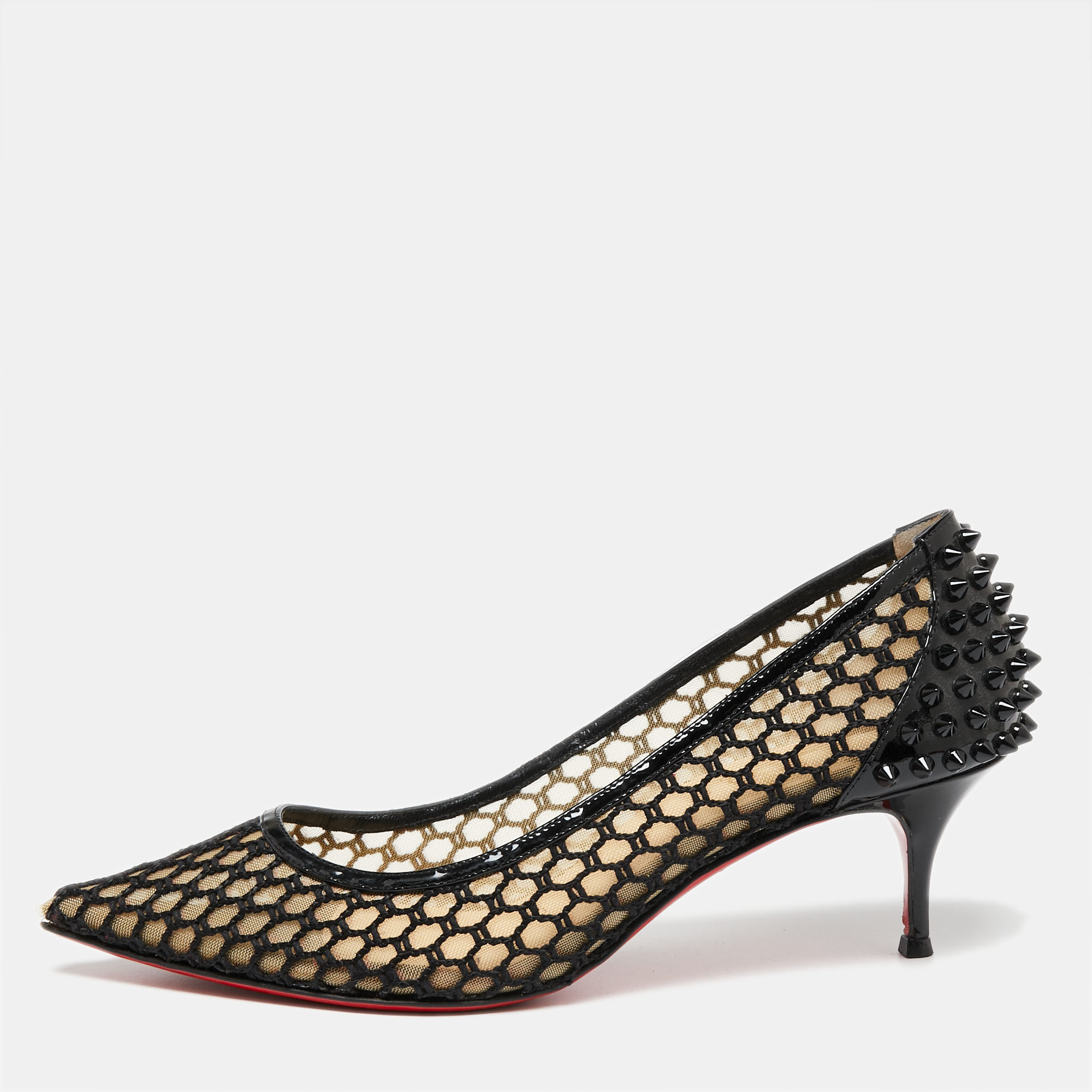 Christian Louboutin brings an element of class to your closet with these stunning Guni pumps. They are created using black mesh and patent leather on the exterior. They showcase pointed toes slim heels and a slip on closure. Make a fashion statement by wearing these gorgeous CL pumps.