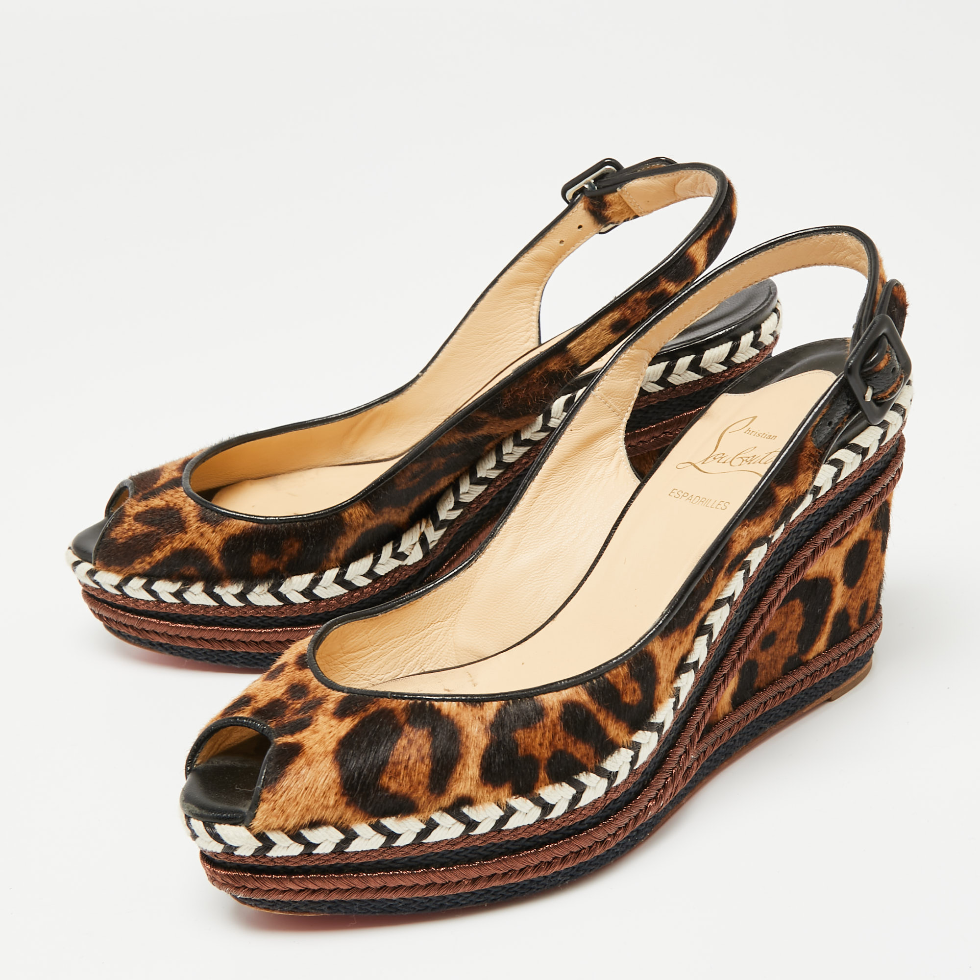 

Christian Louboutin Beige/Brown Leopard Print Calf Hair Peep-Toe Wedge Slingback Pumps Size