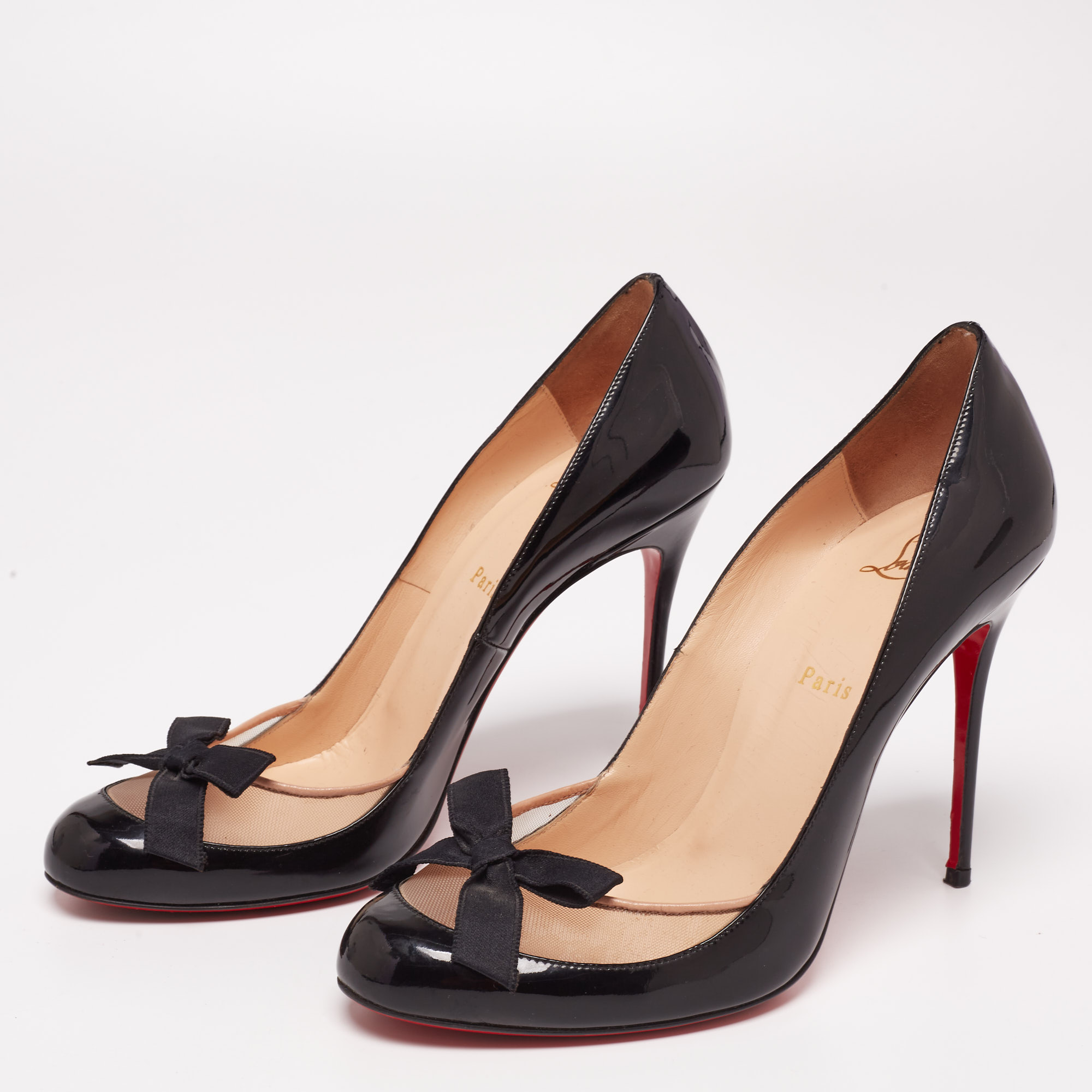 

Christian Louboutin Black Patent Leather and Mesh 'Love Me' Bow Pumps Size