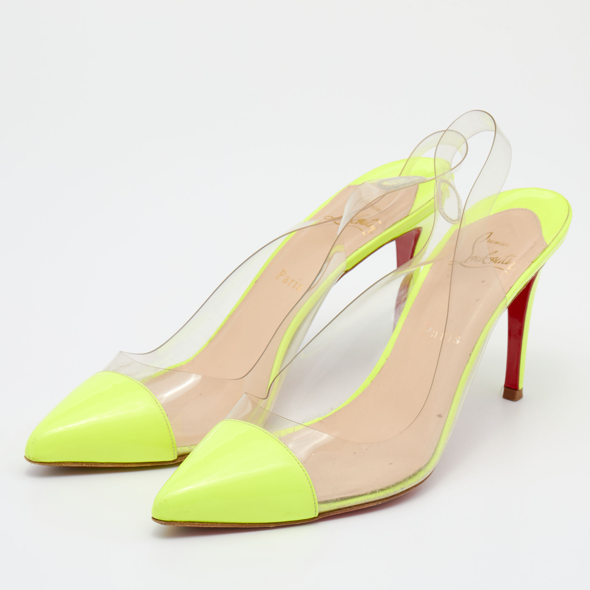 

Christian Louboutin Neon Yellow Leather And PVC Slingback Sandals Size